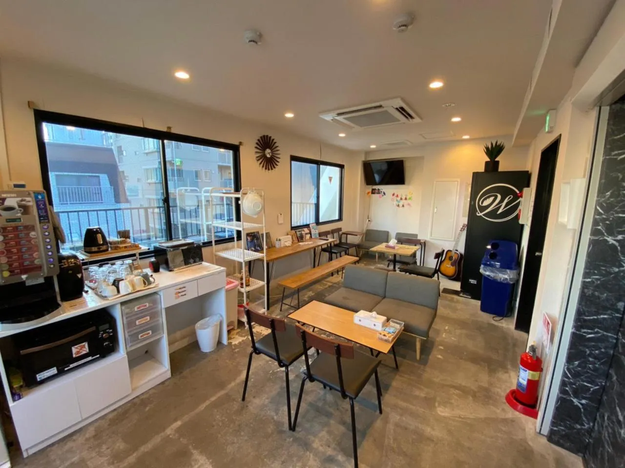Communal lounge/ TV room in TOKYO-W-INN Asakusa