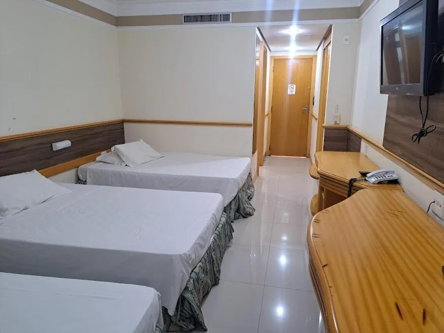 Bed in Hotel Michelangelo