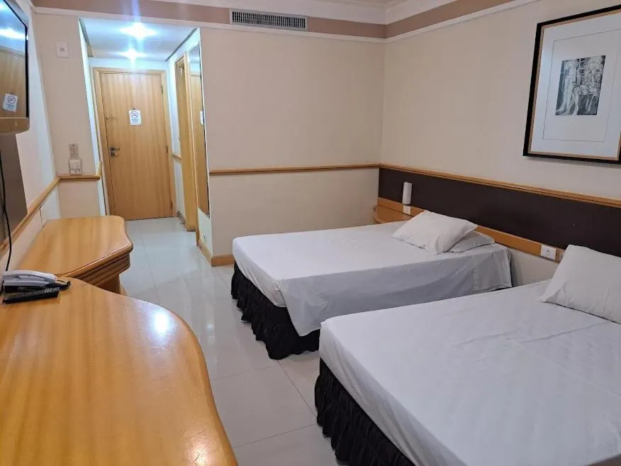 Bed in Hotel Michelangelo