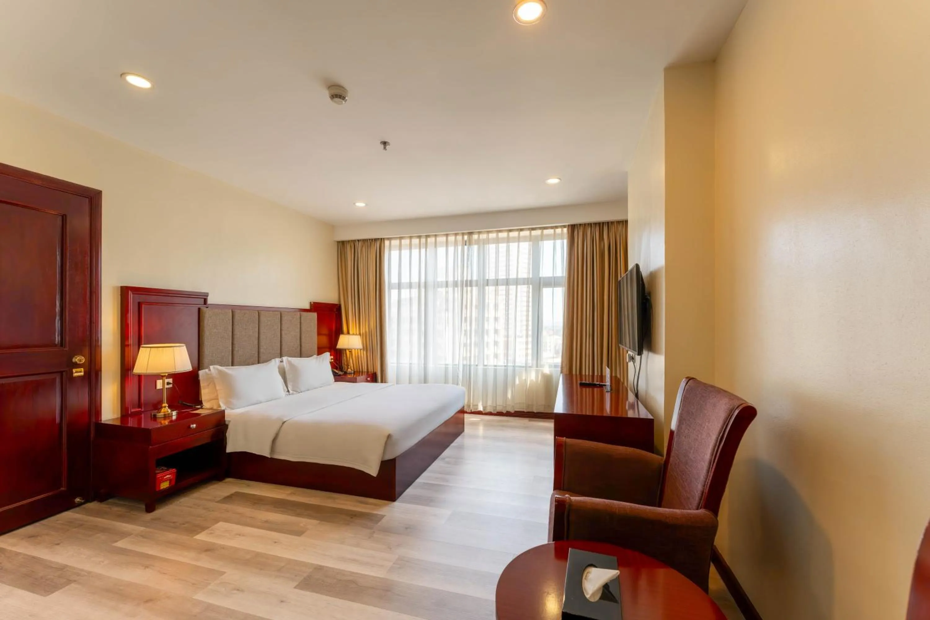 Photo of the whole room, Bed in Swiss-Belhotel Blulane