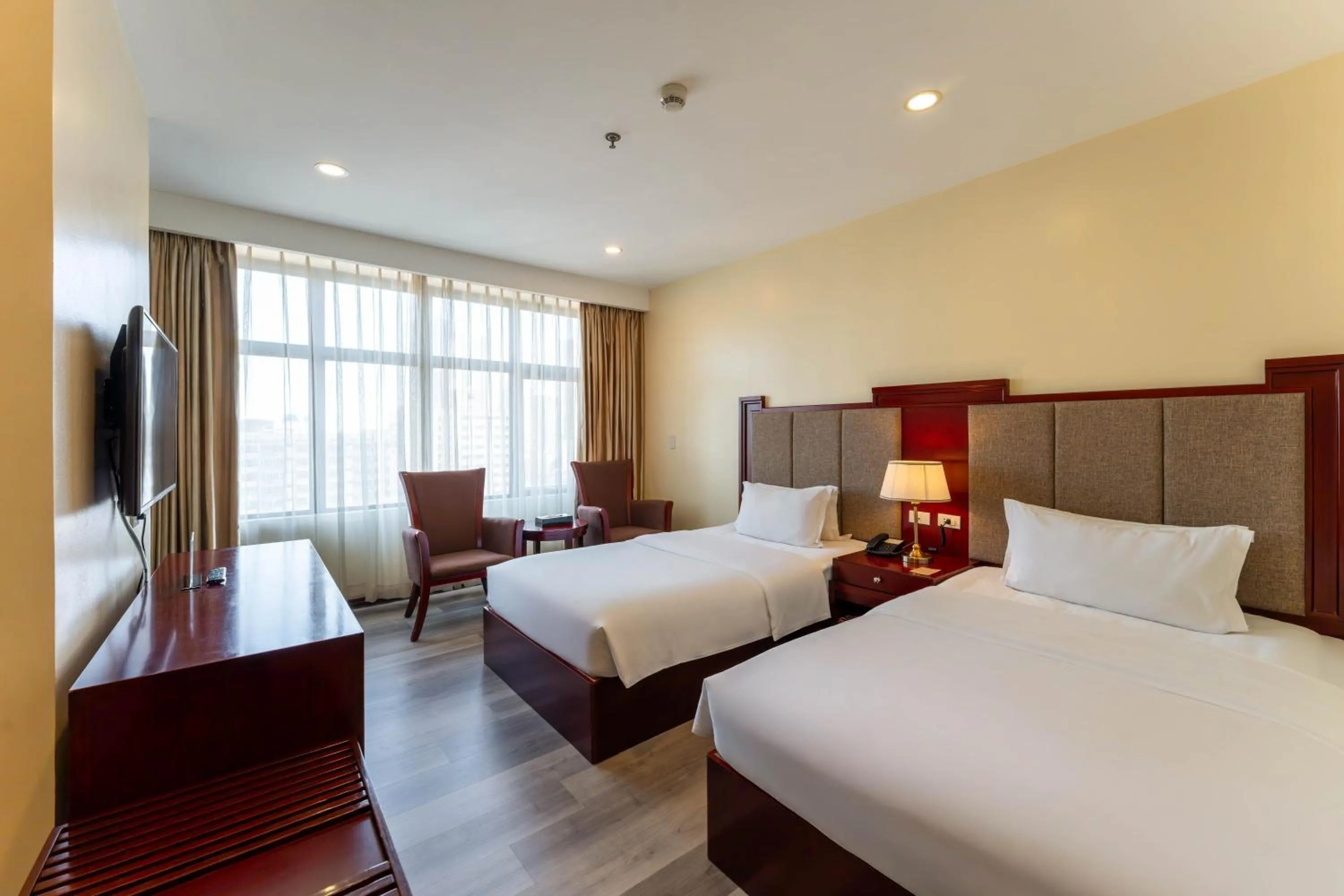 Photo of the whole room, Bed in Swiss-Belhotel Blulane