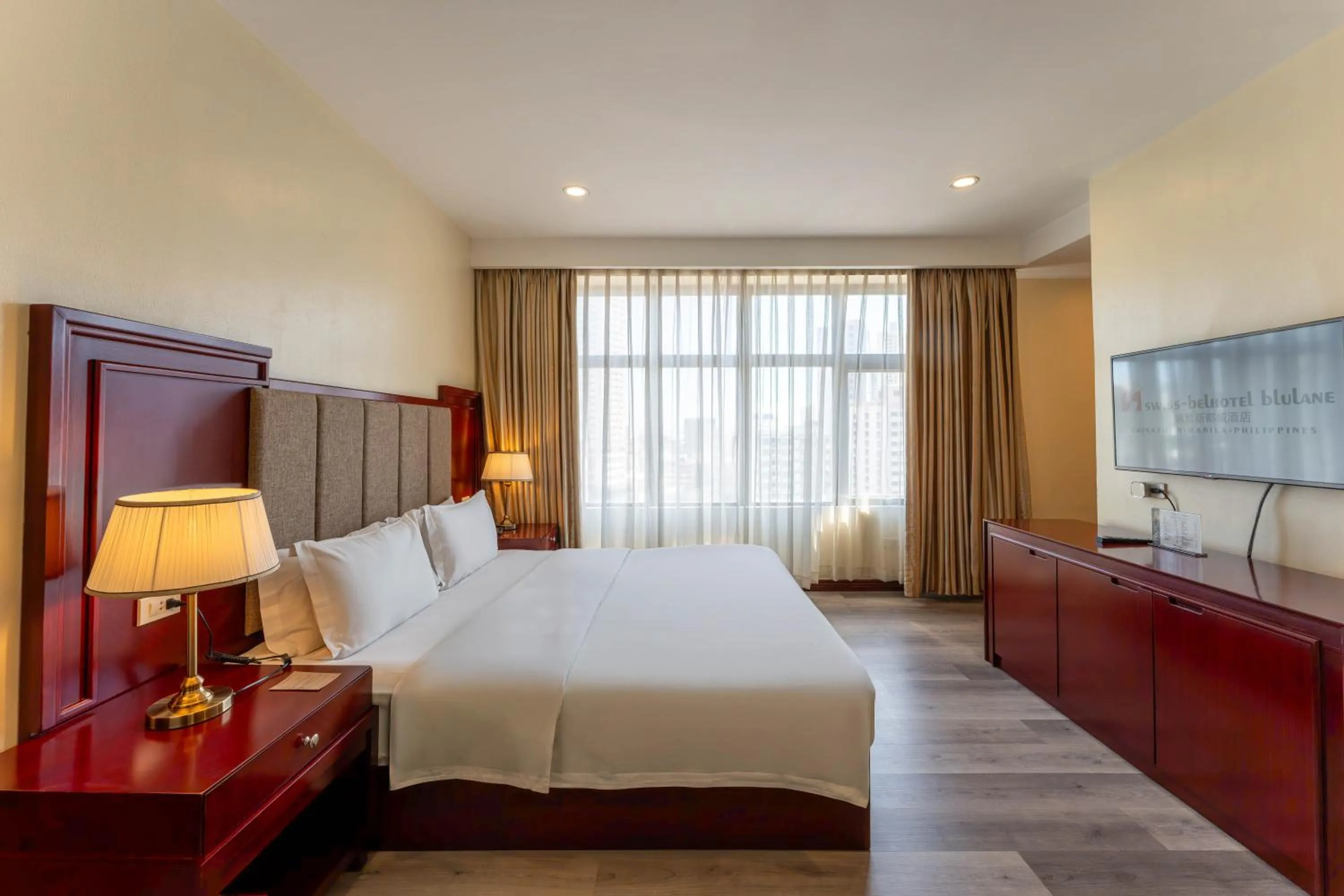 Photo of the whole room, Bed in Swiss-Belhotel Blulane