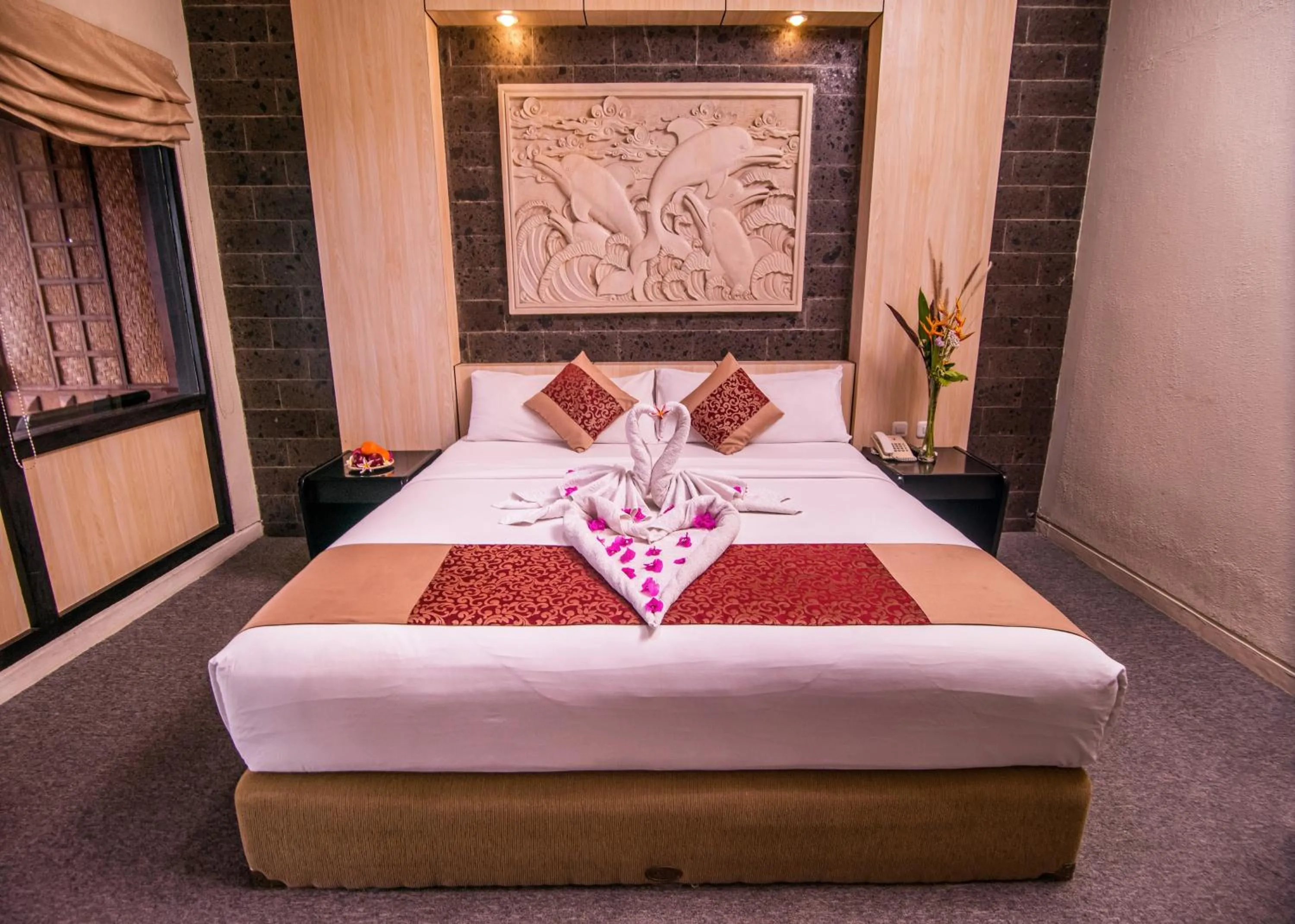 Bed in Nugraha Lovina Seaview Resort & Spa