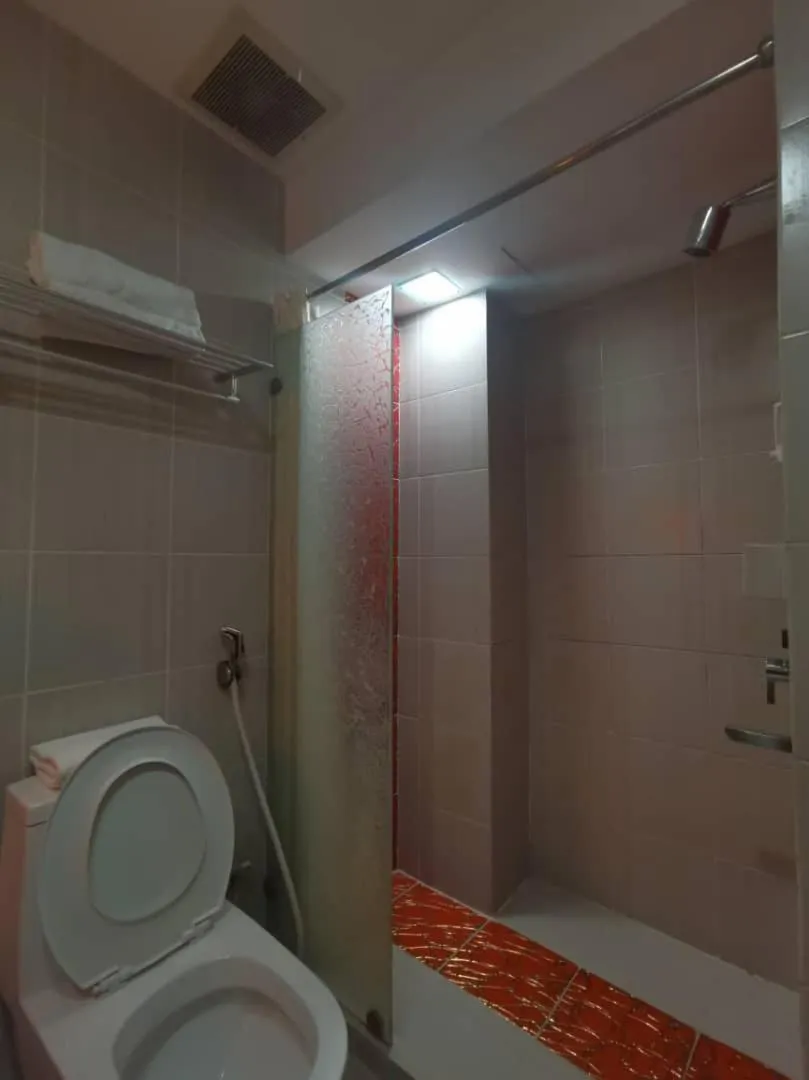 Toilet in 2 Inn 1 Boutique Hotel & Spa