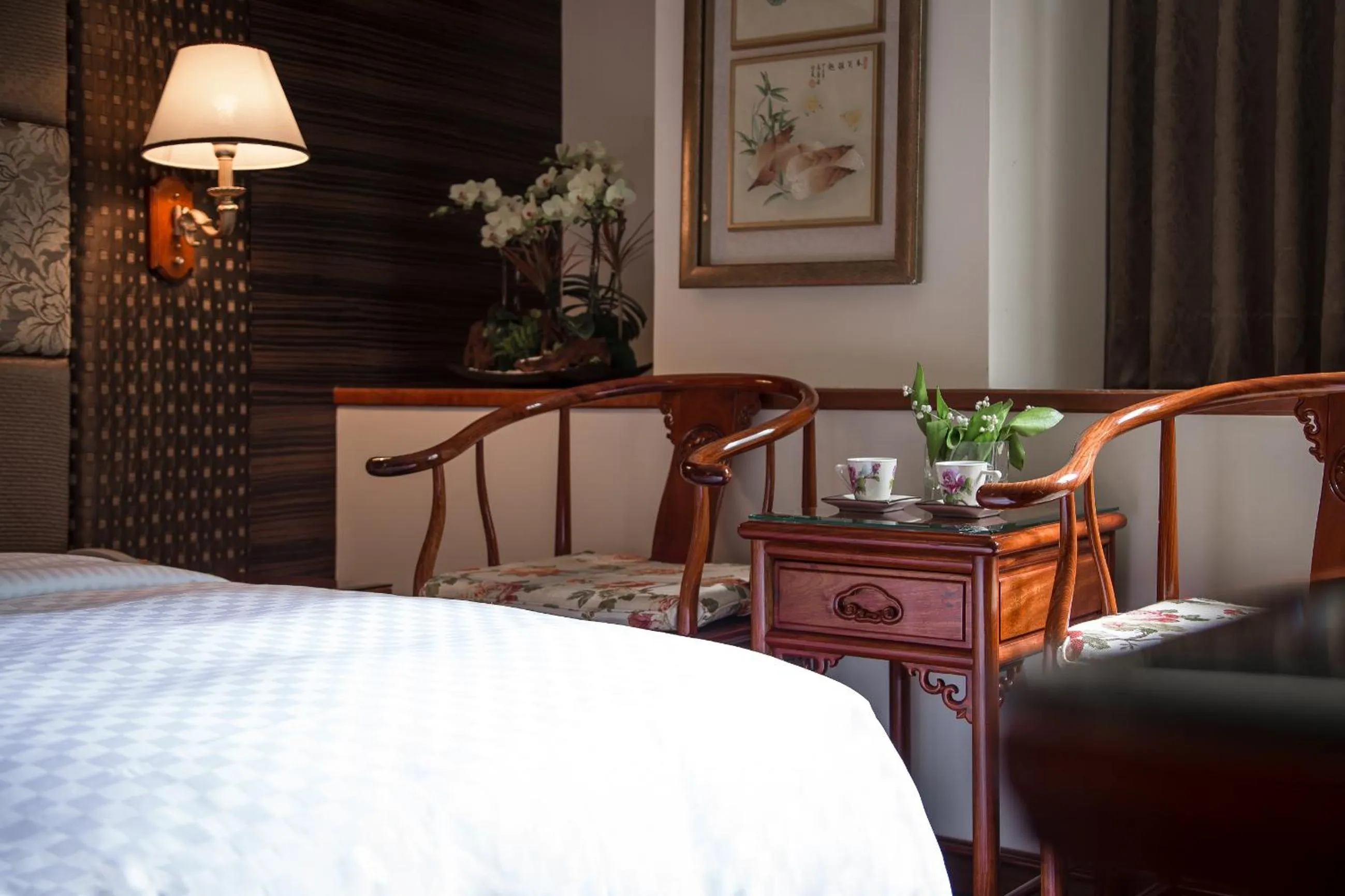 Seating area, Bed in Han She Hotel