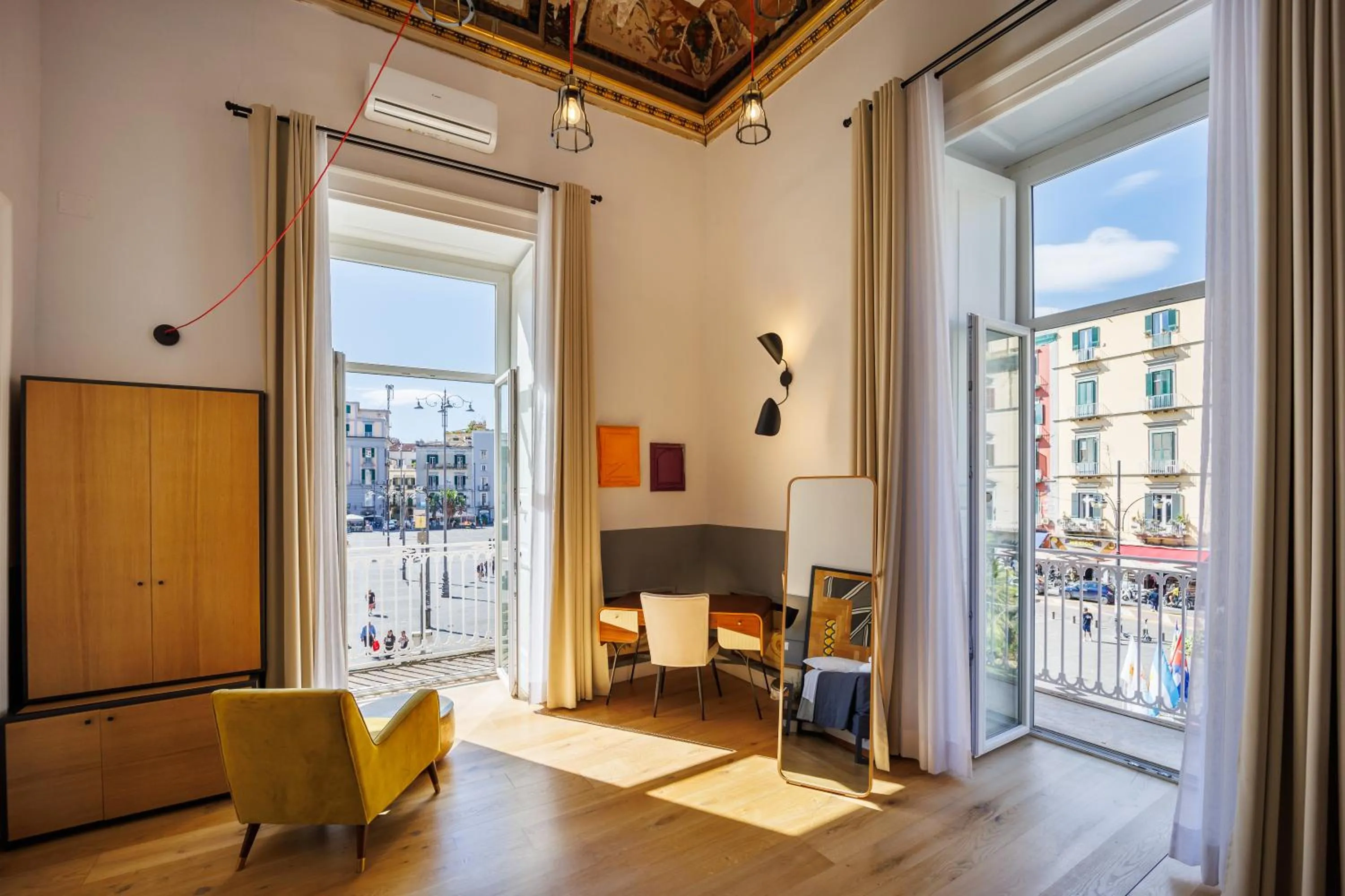 Seating area in The Dante House by House In Naples