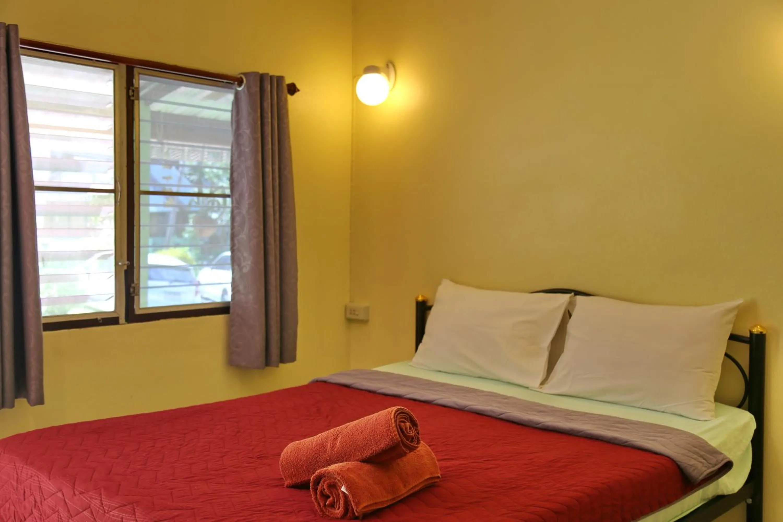 Bed in TP Hut Bungalows