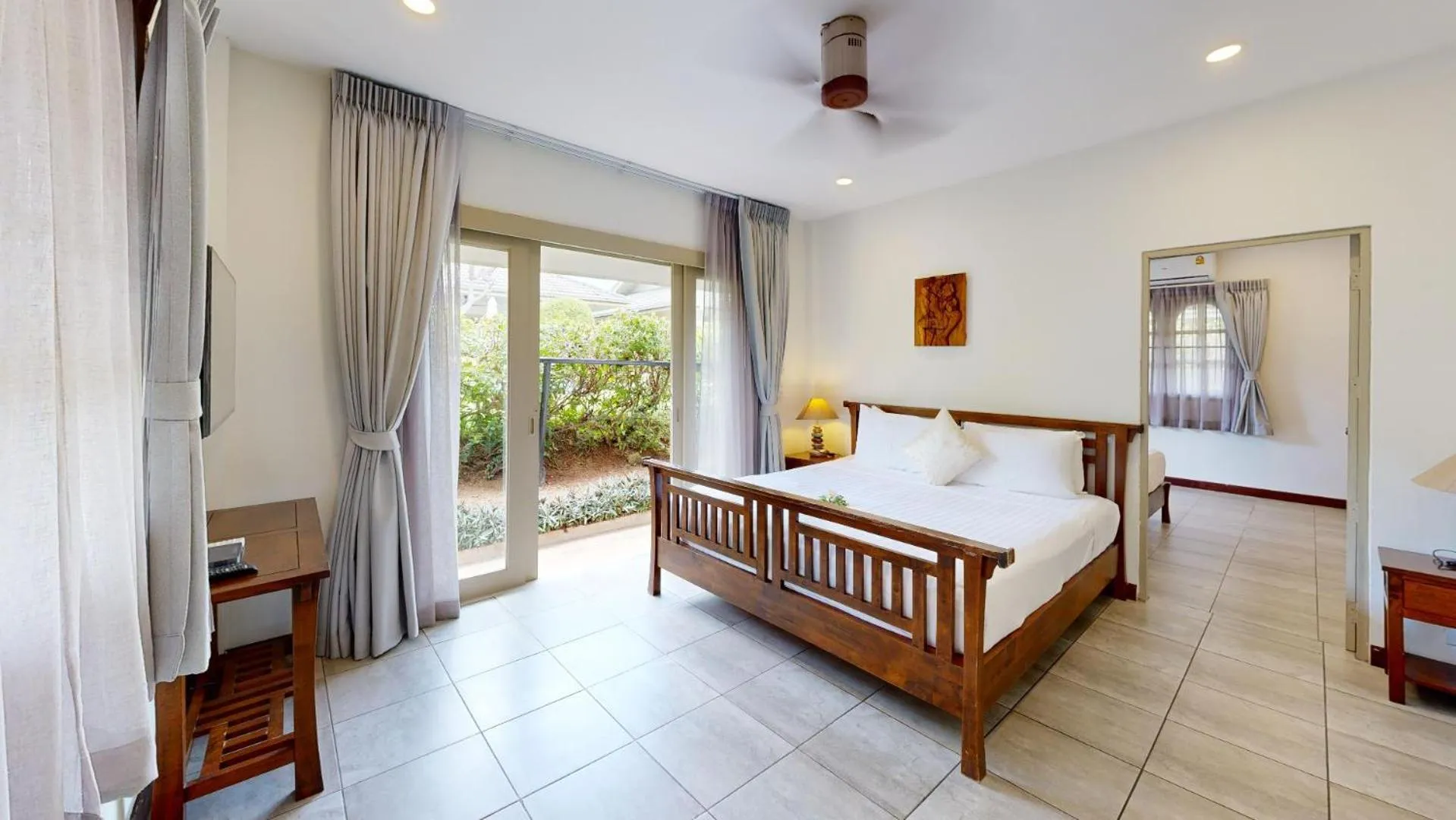 Bed in Idyllic Samui Beach Villa Resort