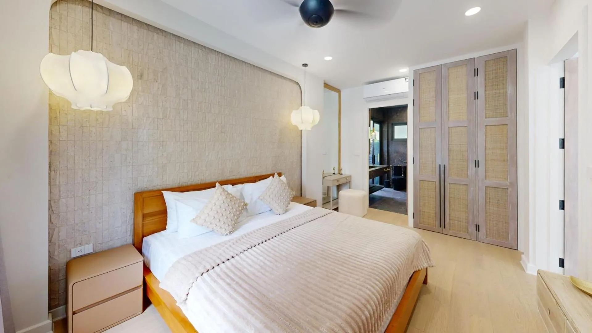 Bed in Idyllic Samui Beach Villa Resort