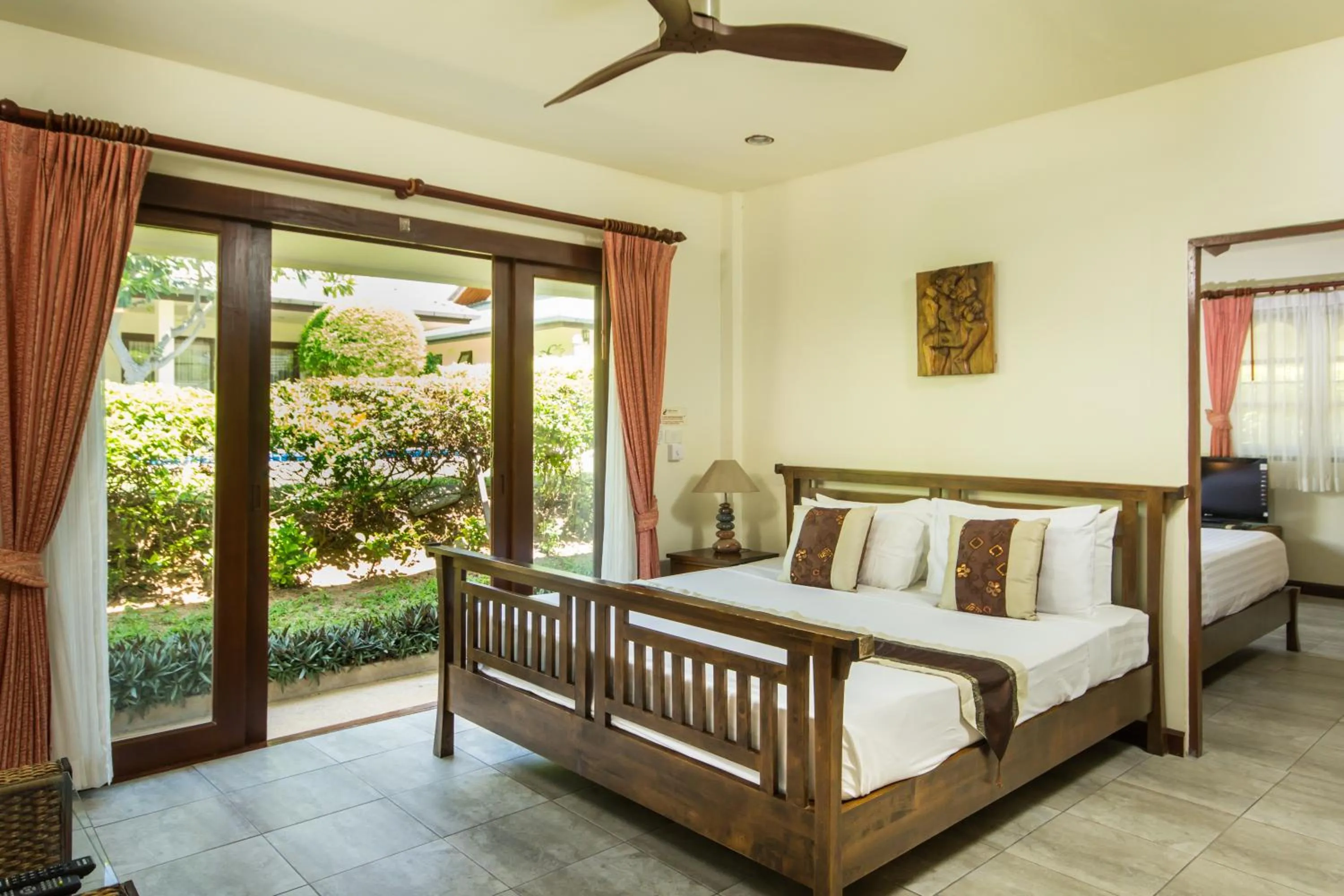 Photo of the whole room, Bed in Idyllic Samui Beach Villa Resort