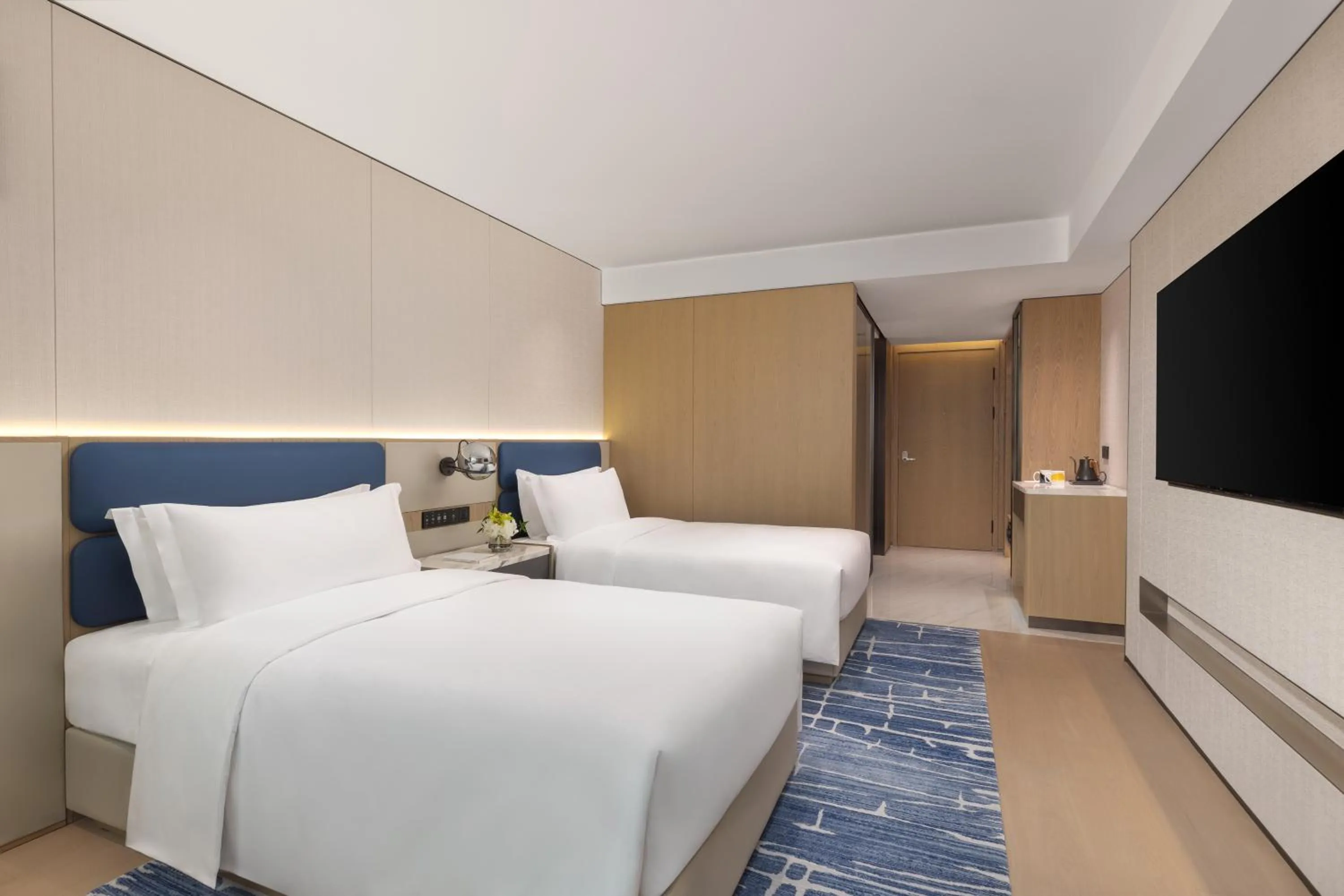 Bed in voco Suzhou Guanqian Street by IHG