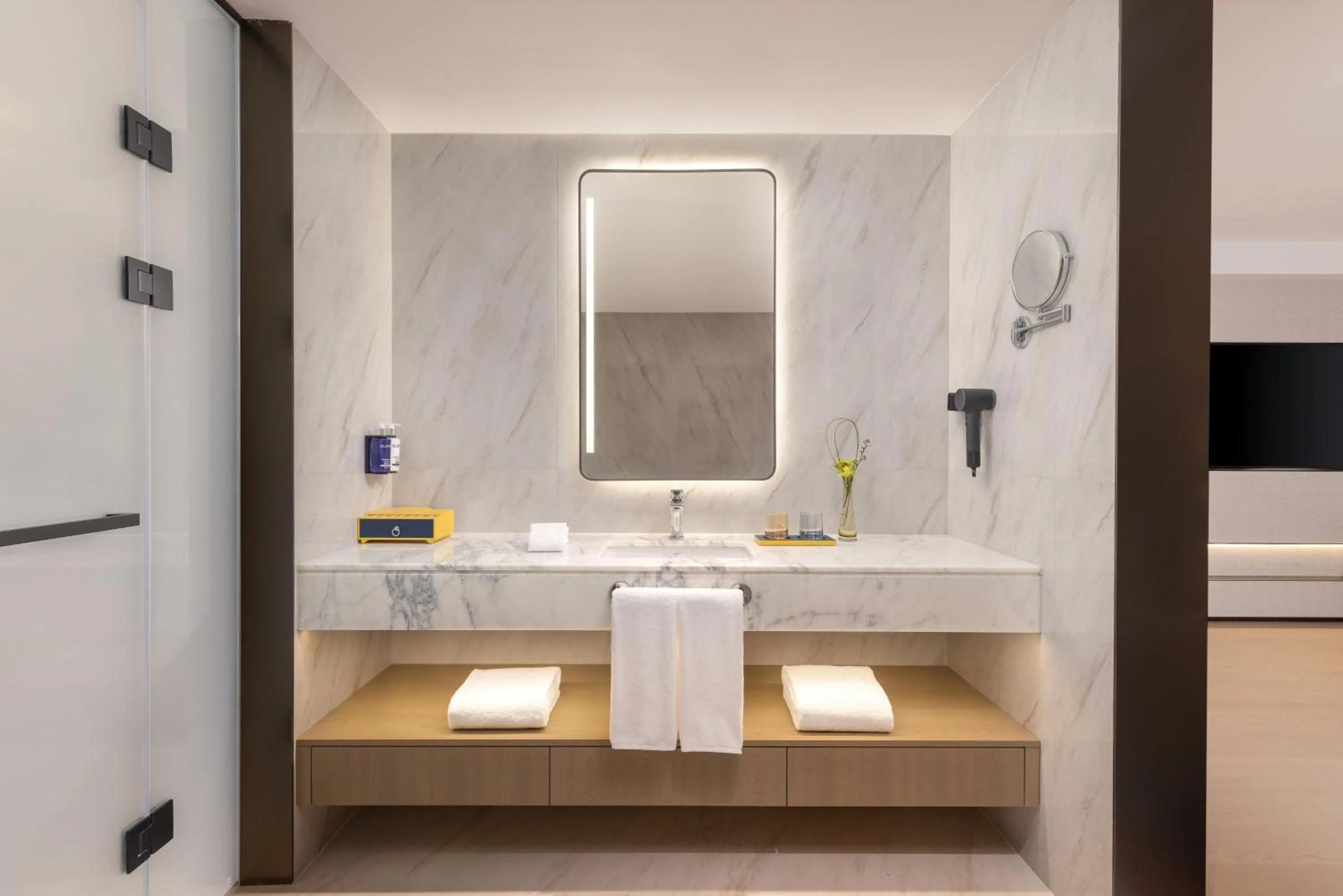 Bathroom in voco Suzhou Guanqian Street by IHG