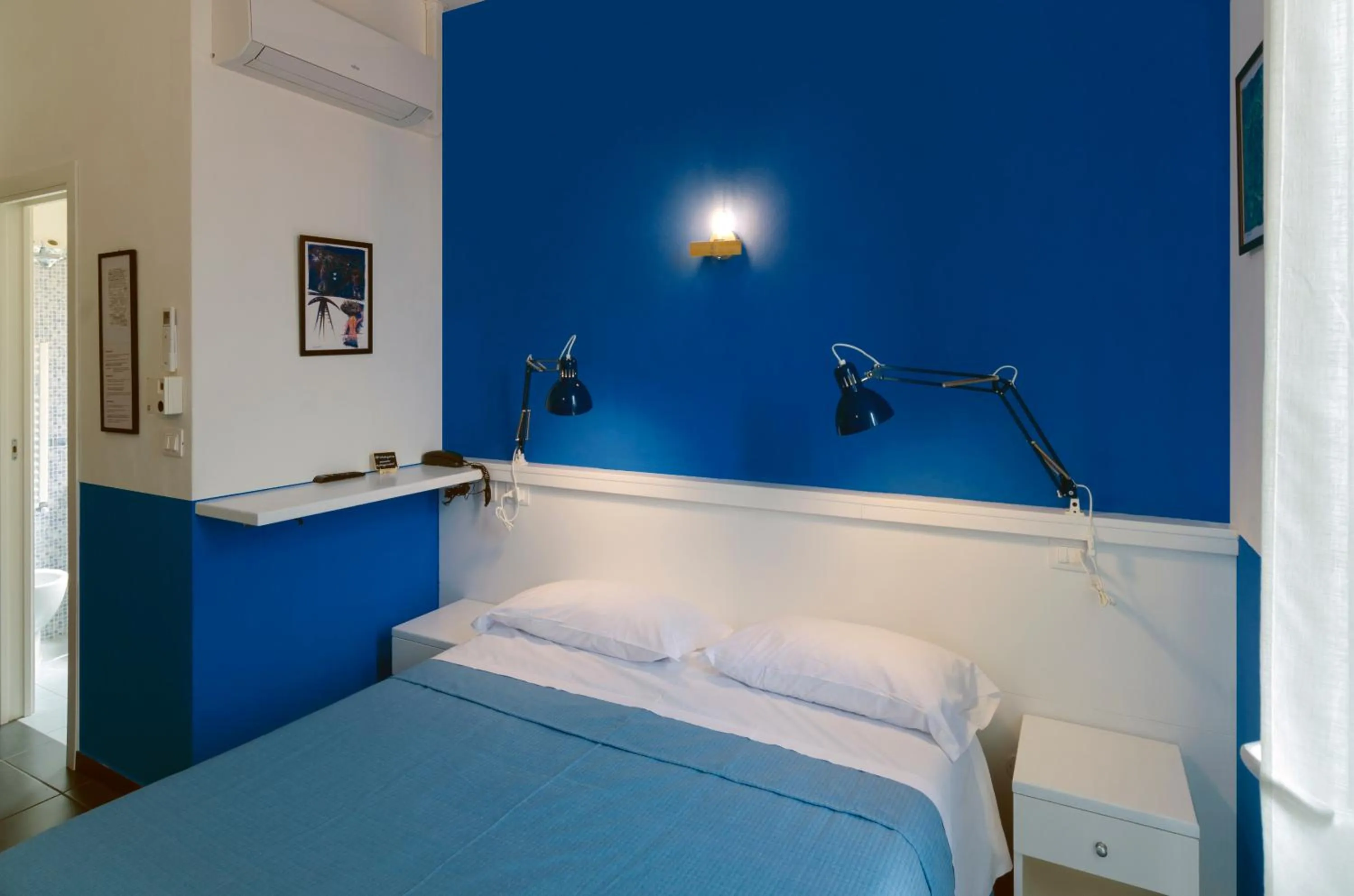 Bed in Hotel Villa Argentina