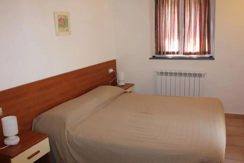 Bed in Hotel Villa Argentina