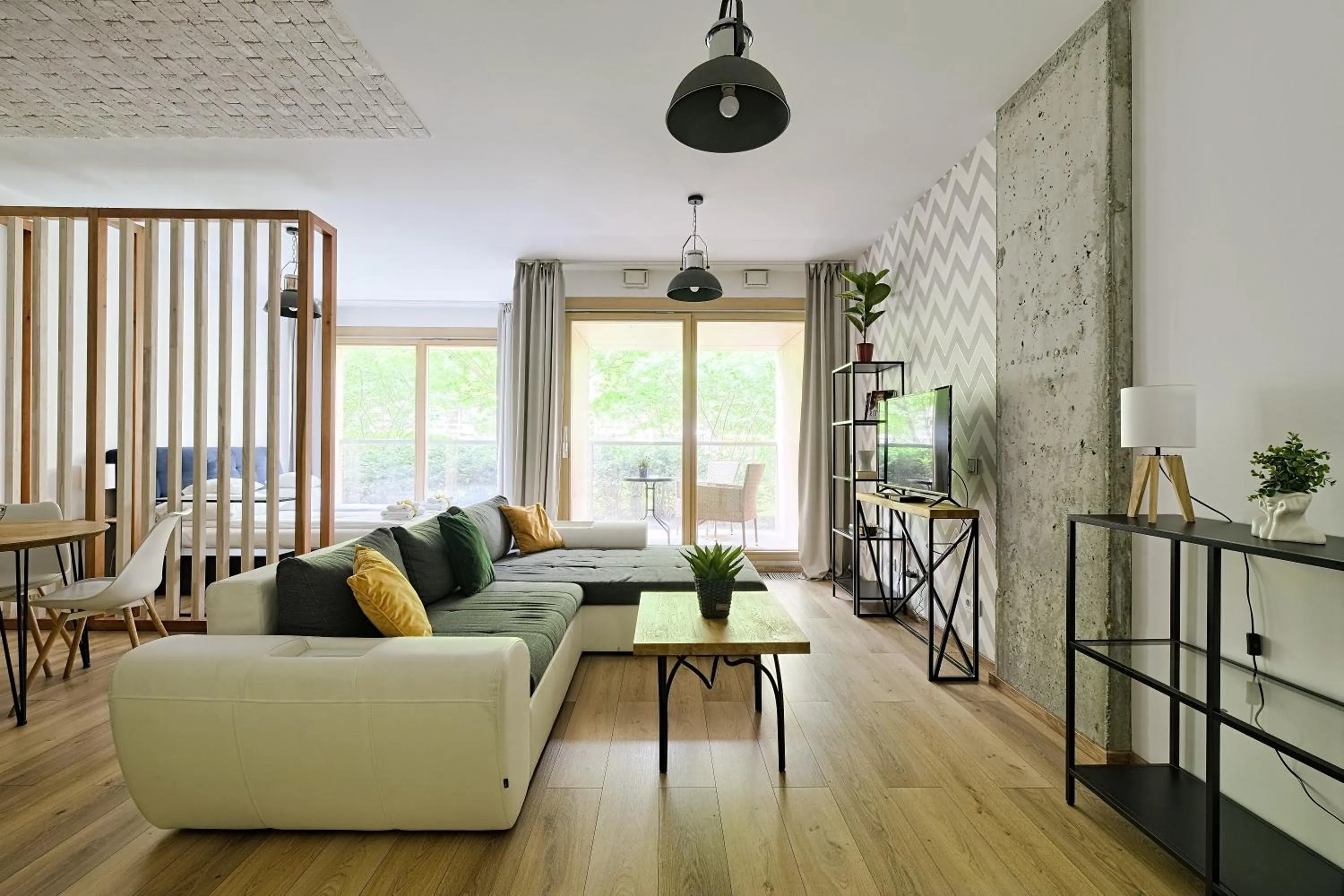 Seating area in ApartHotel Kolejowa Apartamenty