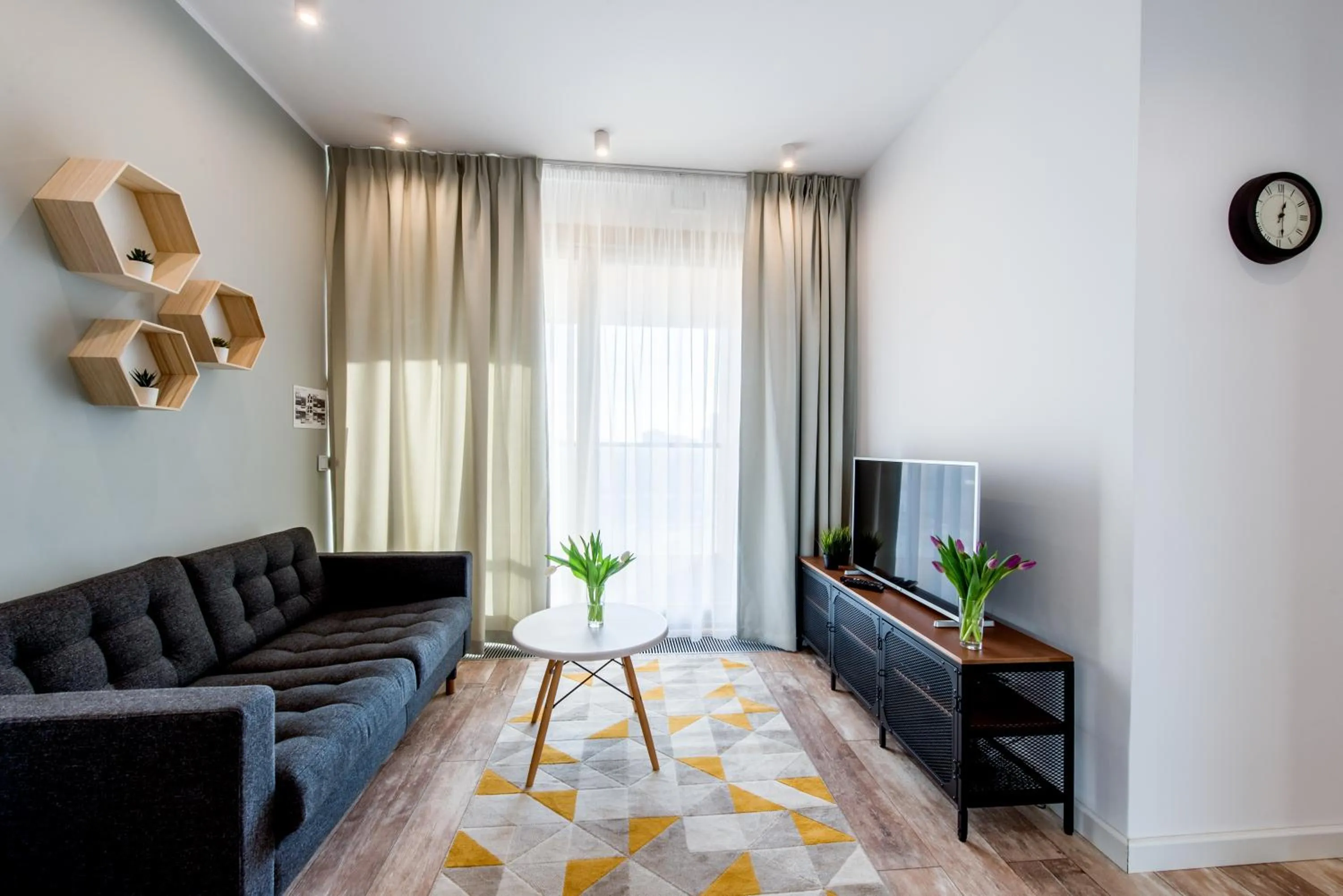 Seating area in ApartHotel Kolejowa Apartamenty