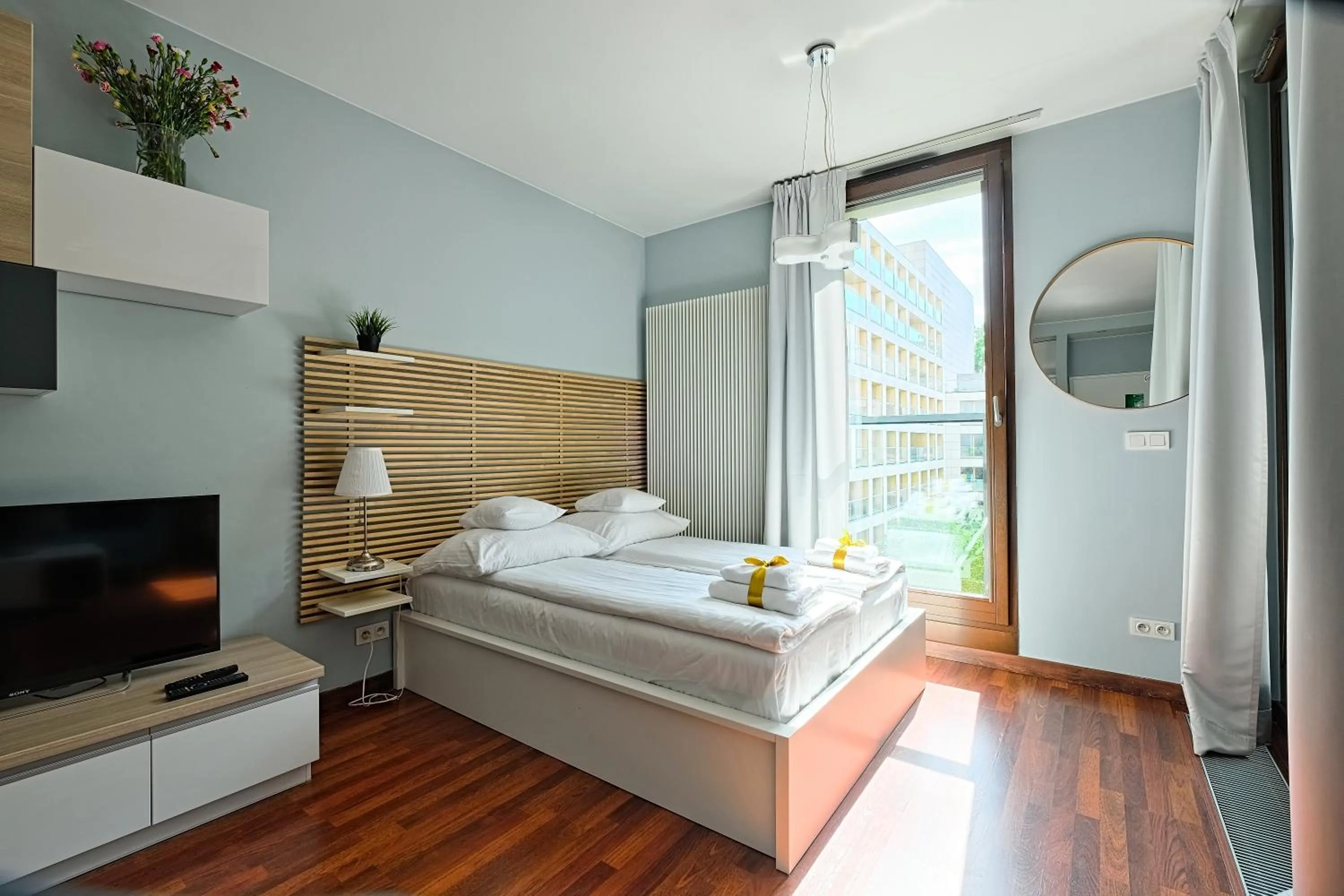 Bed in ApartHotel Kolejowa Apartamenty