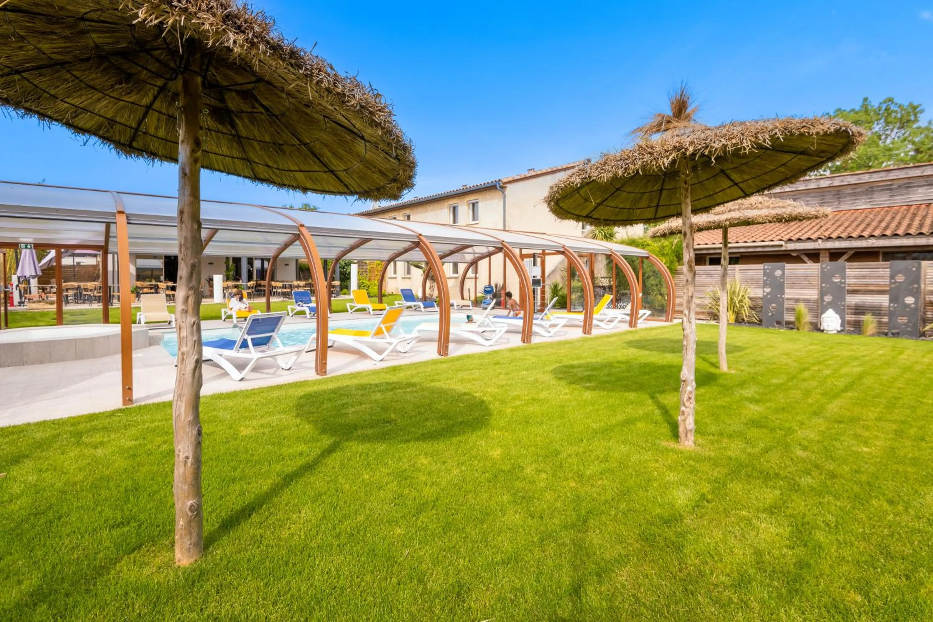 Garden in LOGIS Hôtel Restaurant Le Clos Fleuri