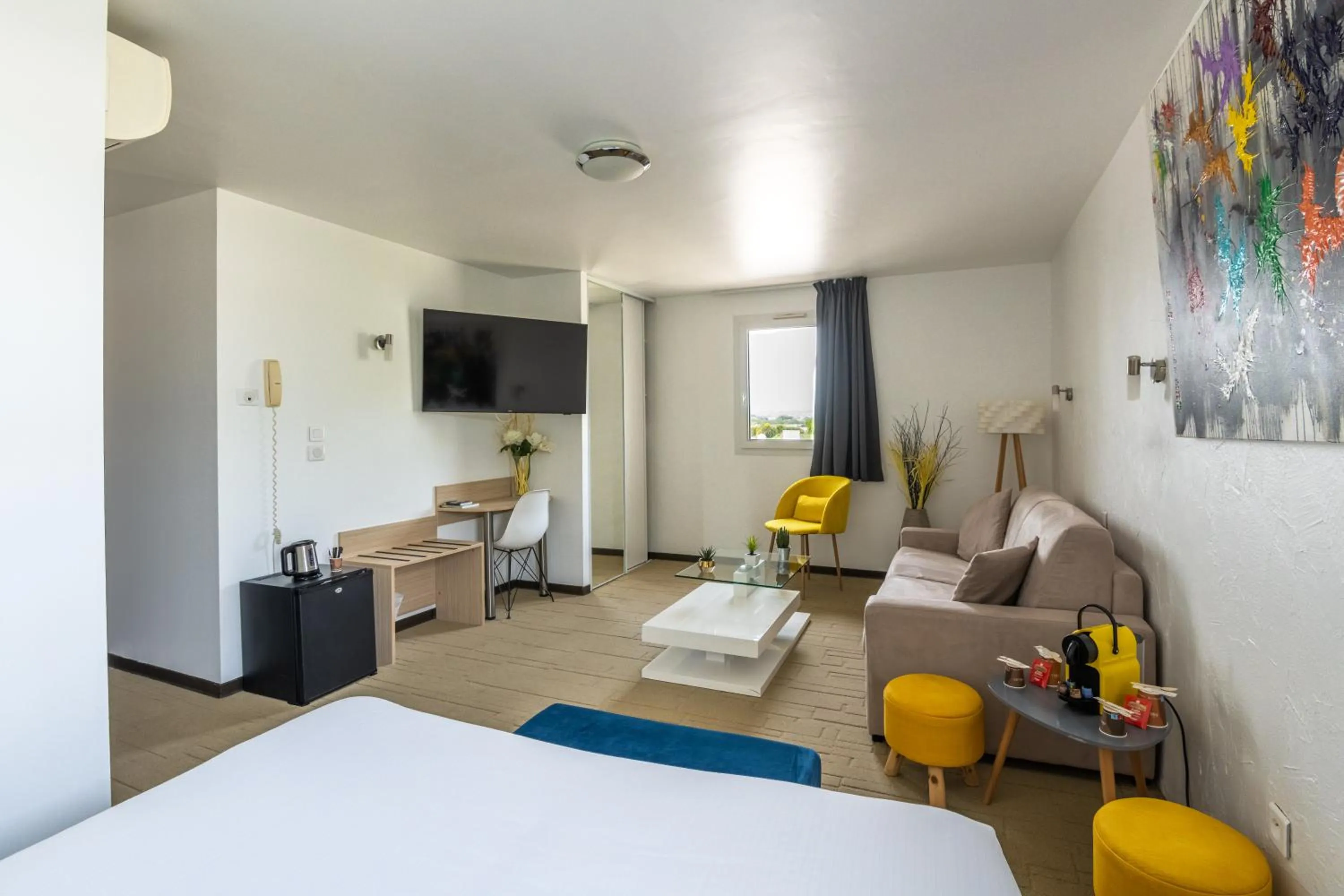 Photo of the whole room, Bed in LOGIS Hôtel Restaurant Le Clos Fleuri