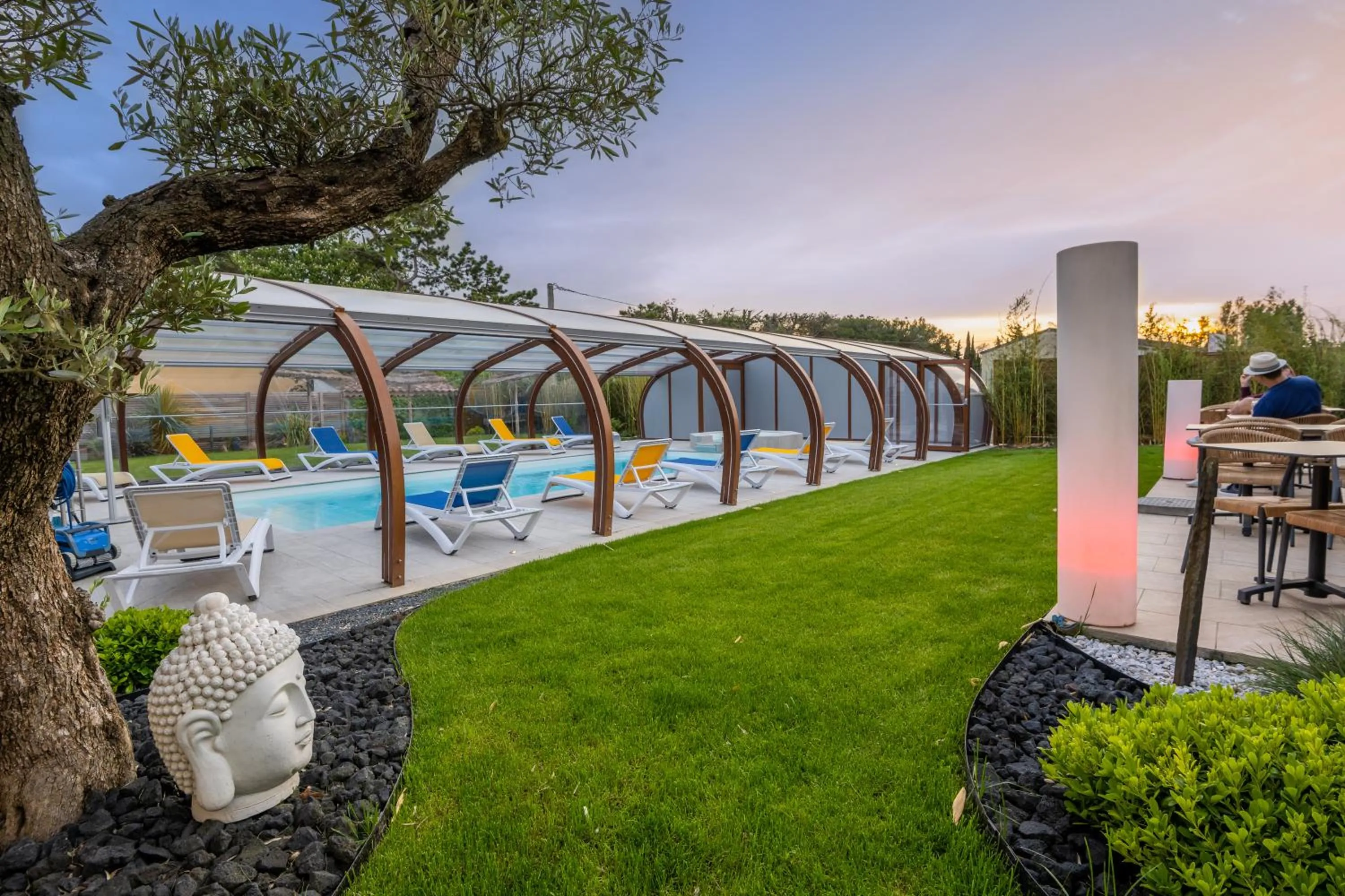 Garden in LOGIS Hôtel Restaurant Le Clos Fleuri