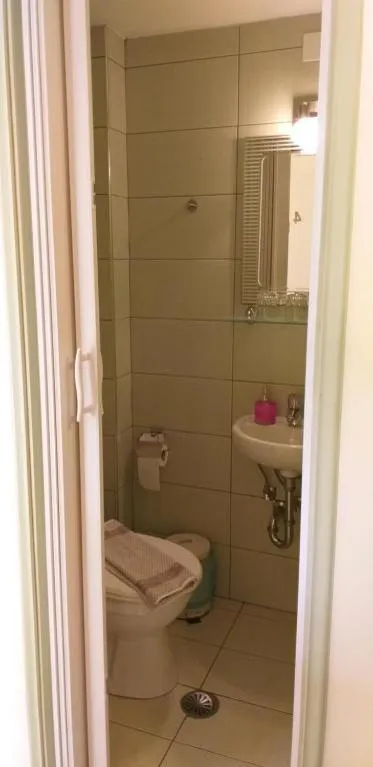 Bathroom in Hariklia Rent Rooms