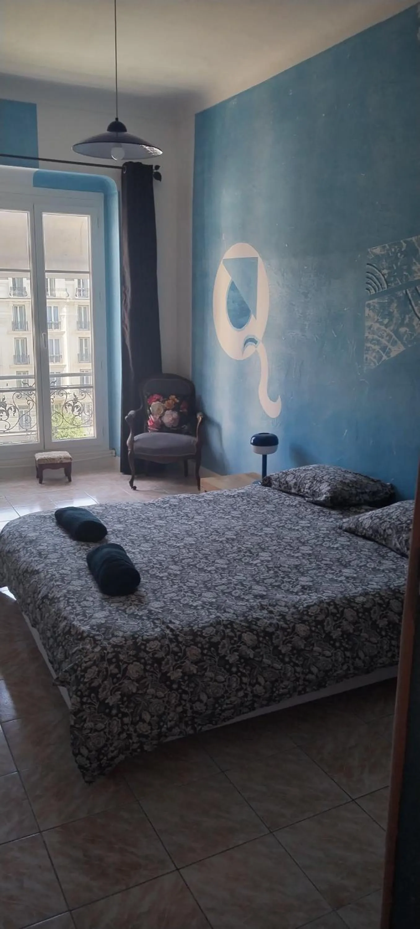 Bed in Chez Brigitte Guesthouse