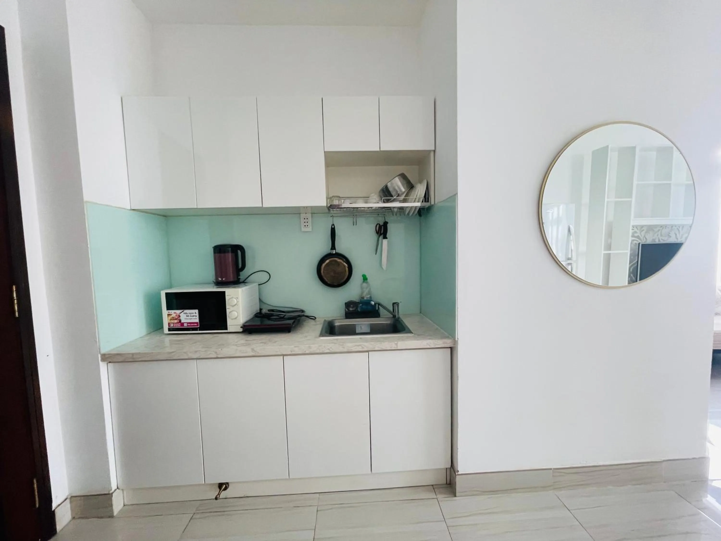 Kitchen or kitchenette in Grace Apartment - HCM