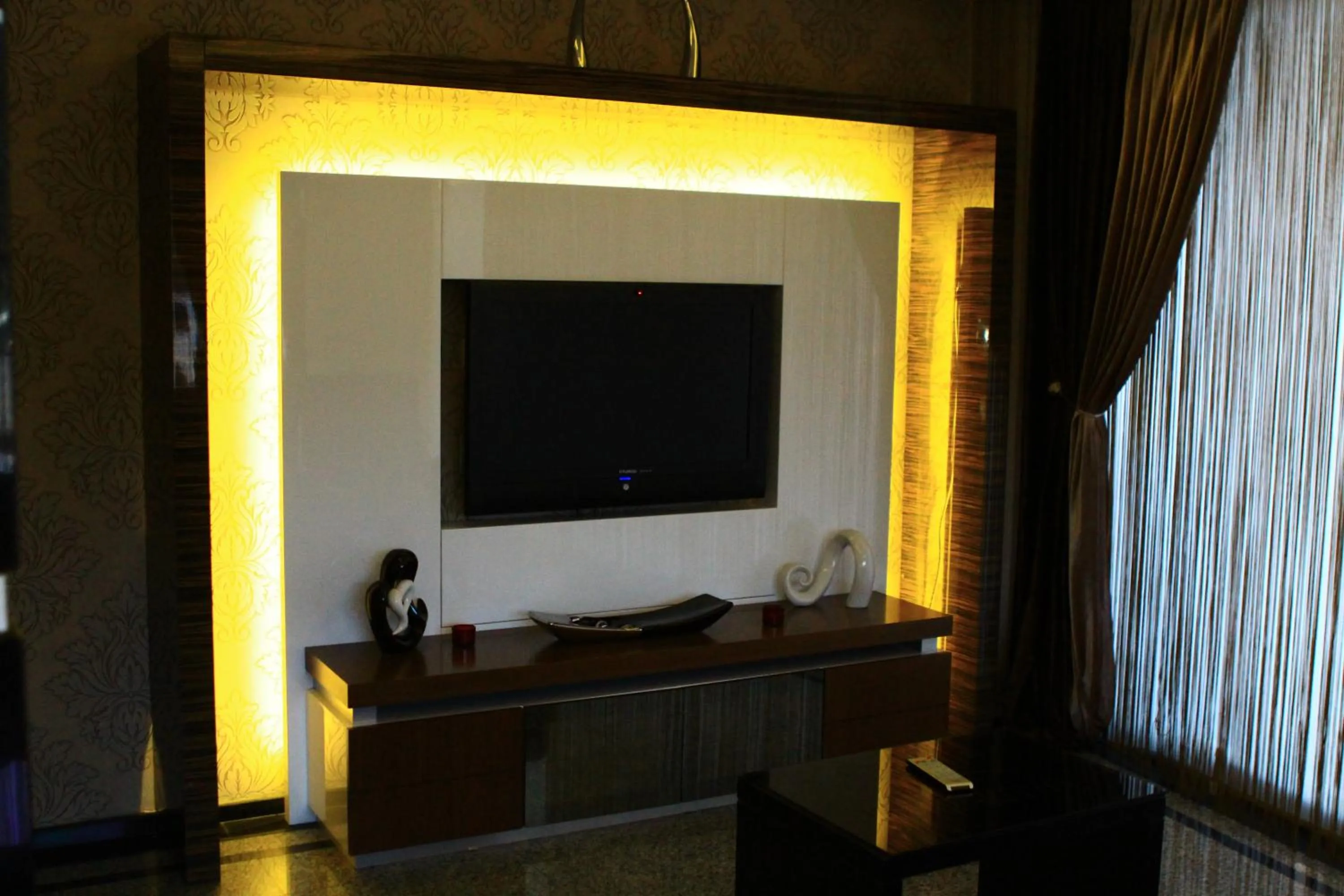 Communal lounge/ TV room in Lioncity Hotel