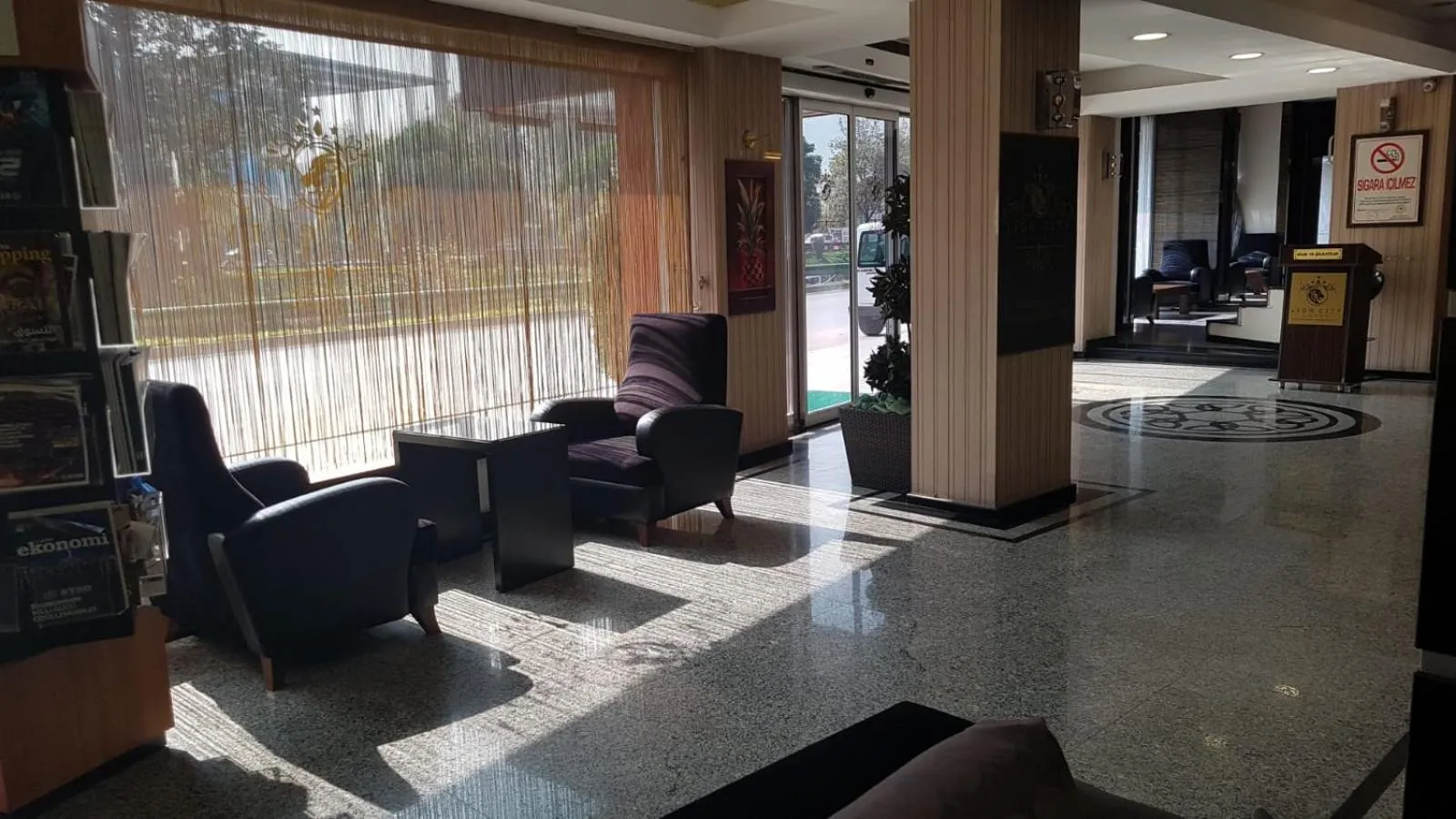 Communal lounge/ TV room in Lioncity Hotel