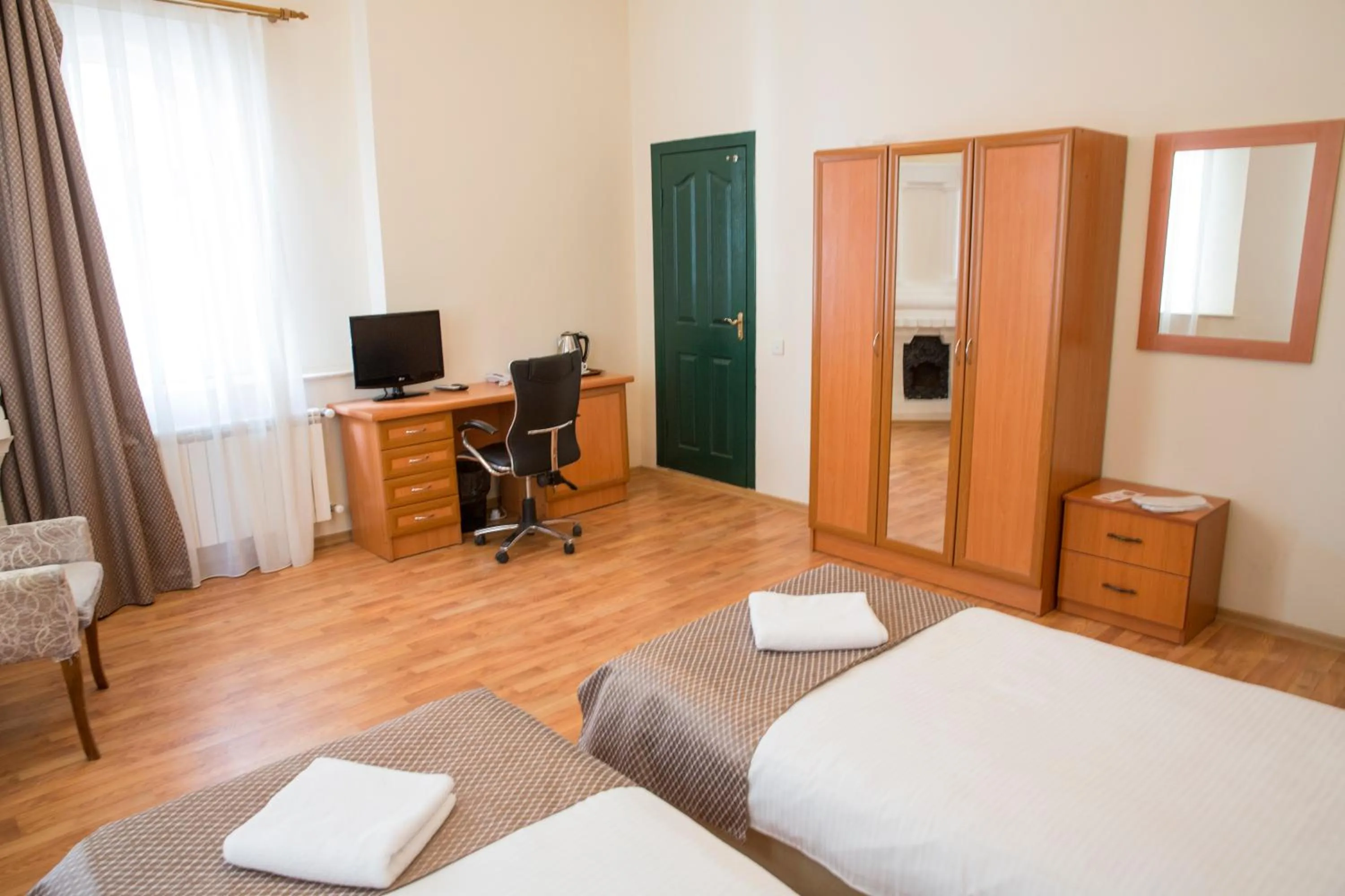 Bed in Old City Inn Hotel