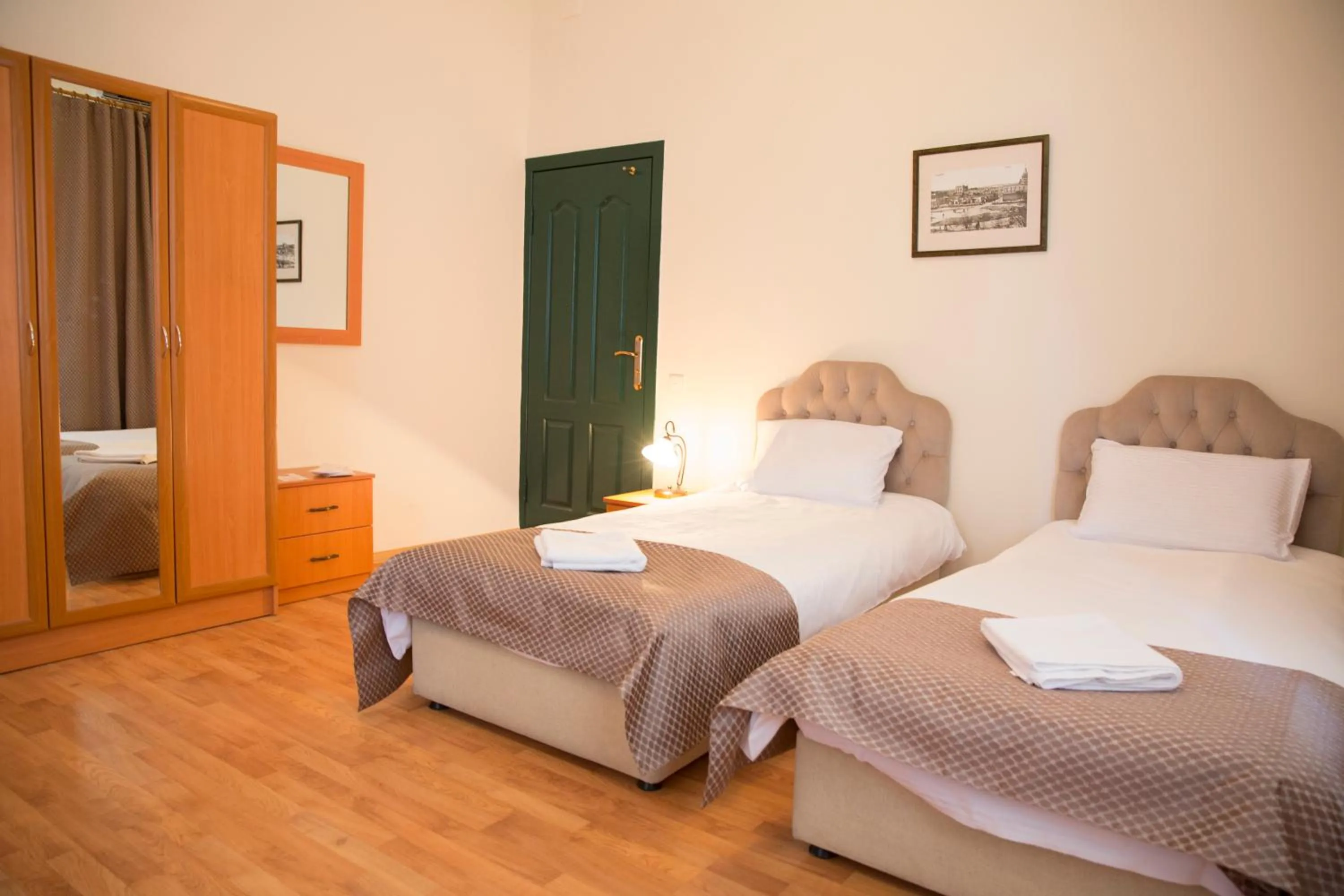 Bed in Old City Inn Hotel