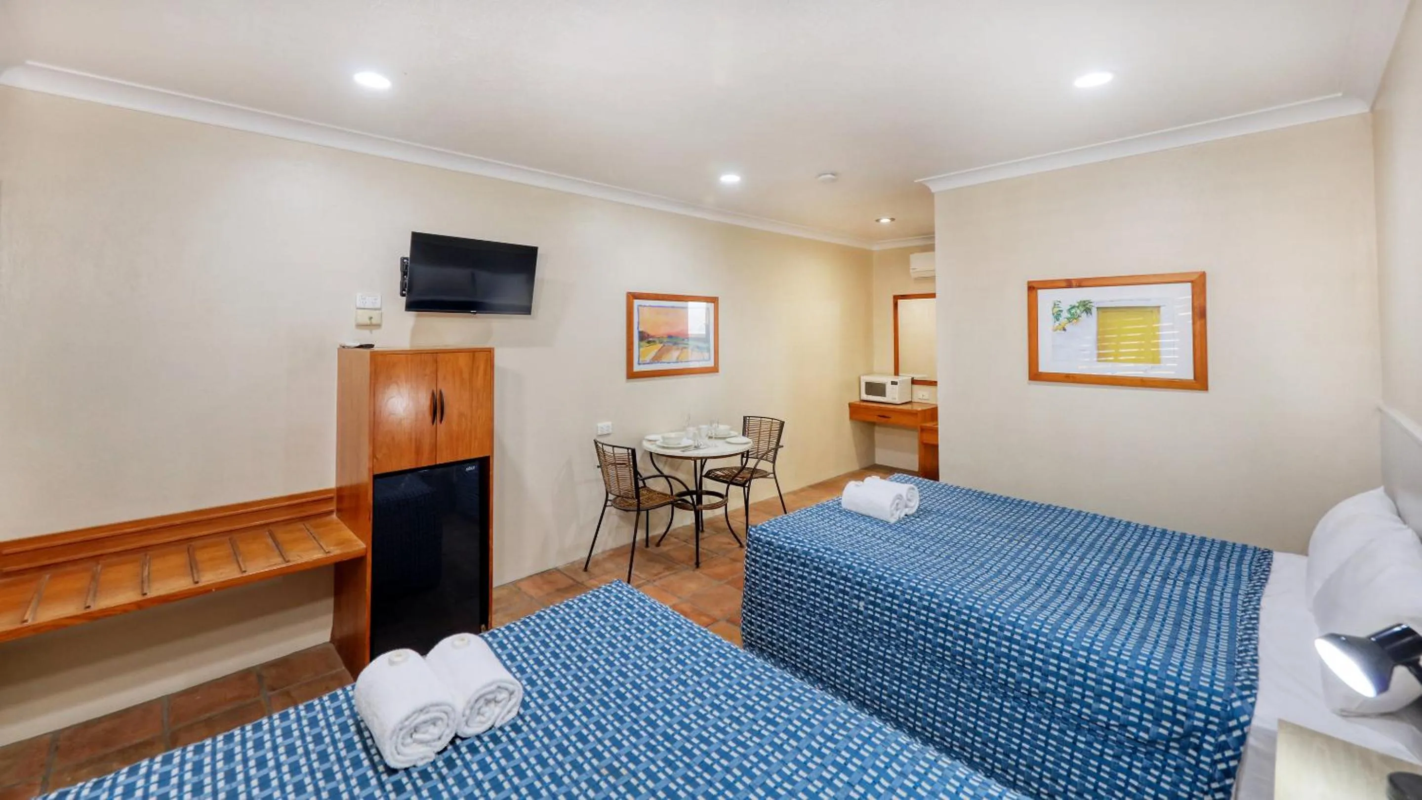 Bed in Mackay Rose Motel