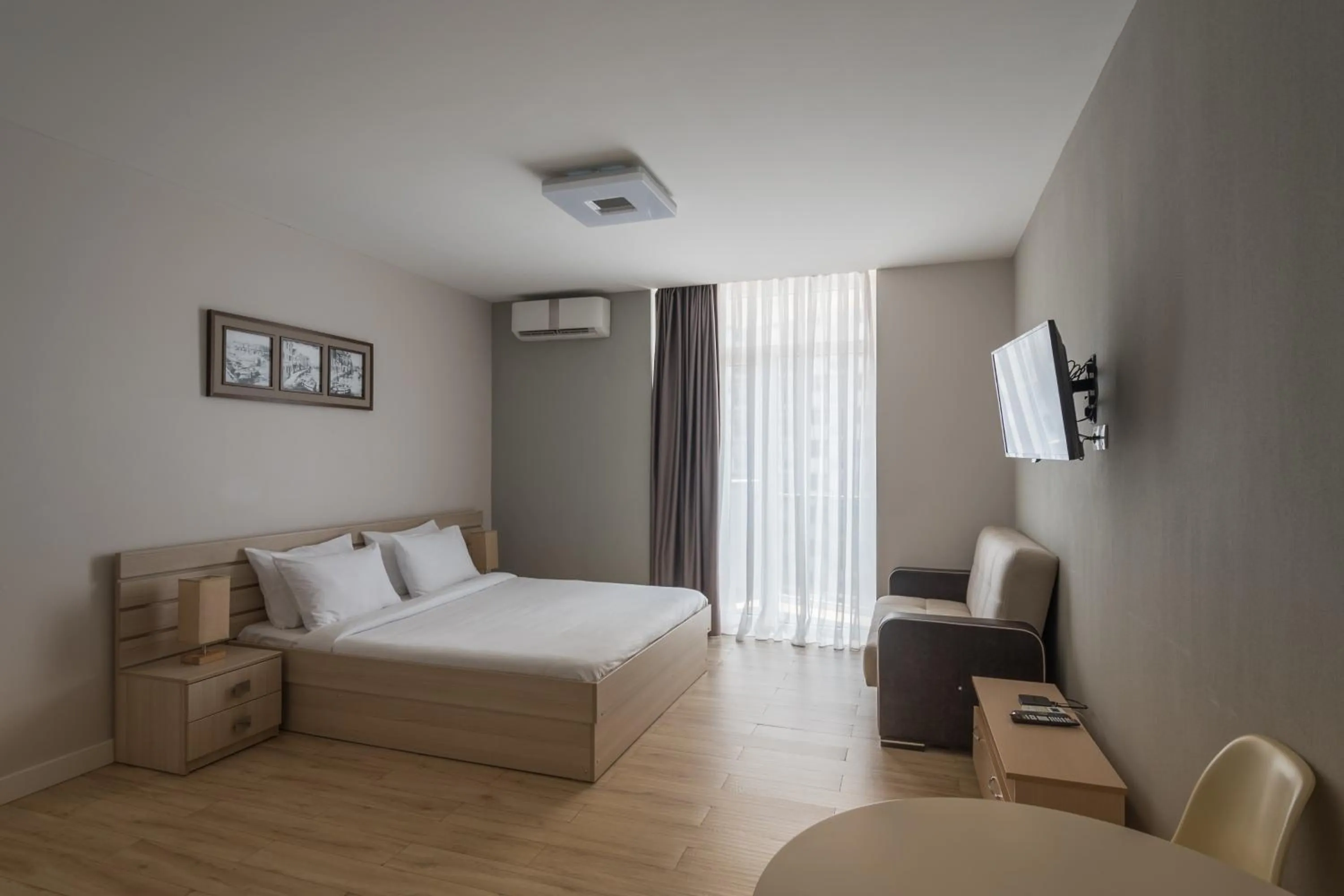 Living room, Bed in Orbi Sea Towers Hotel Official