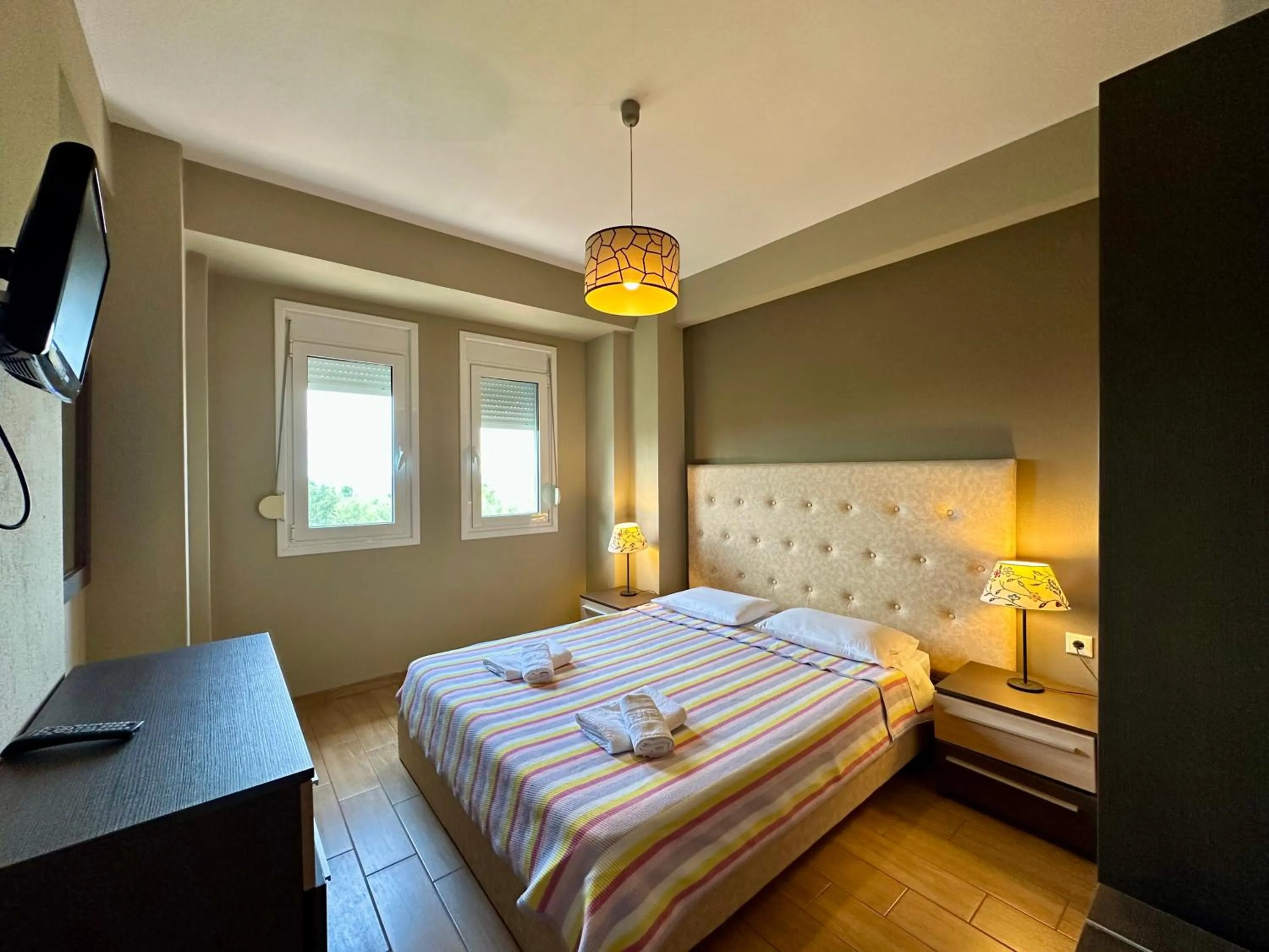 Bed in Agrili Apartments & Rooms