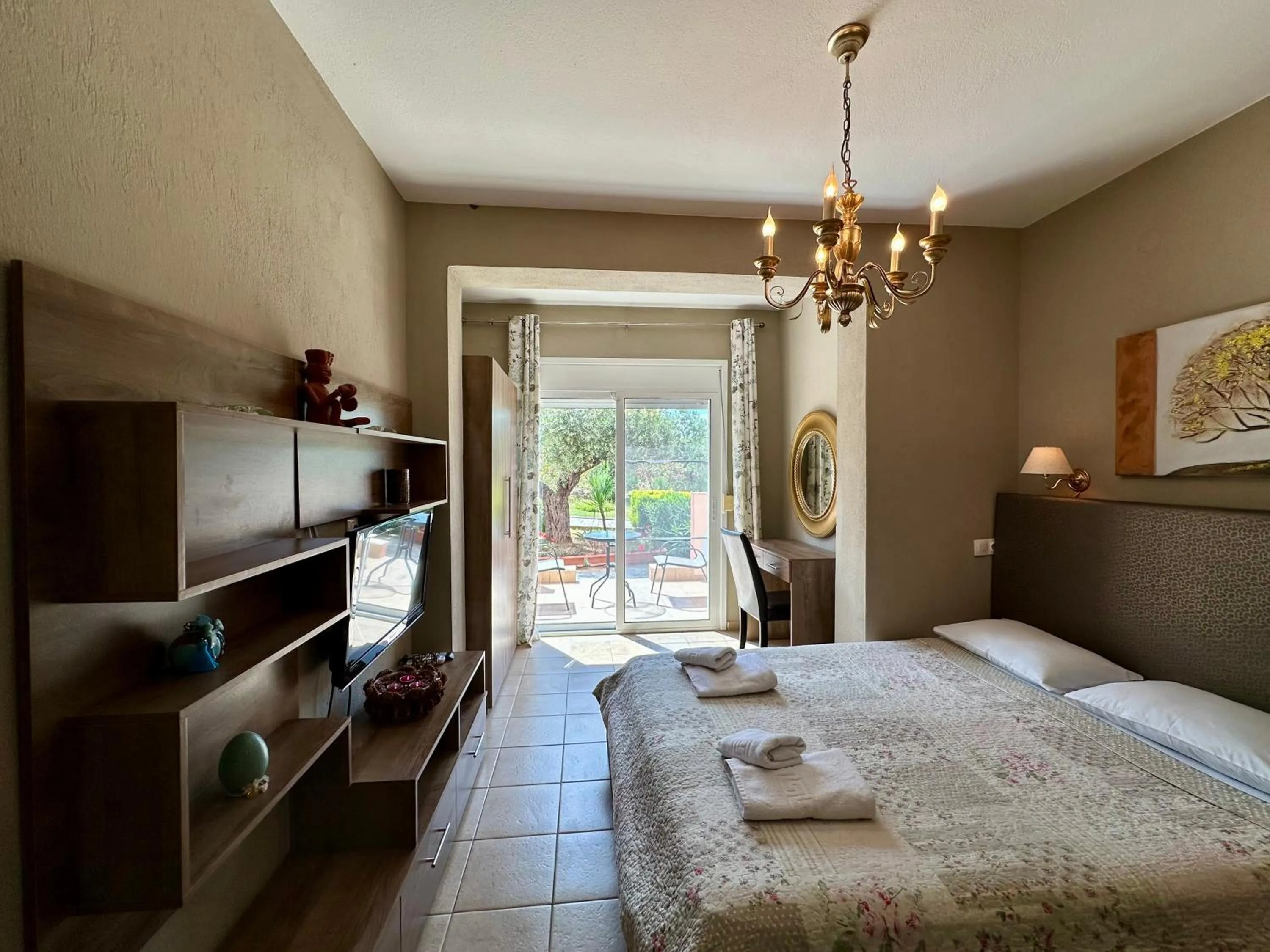 Bed in Agrili Apartments & Rooms