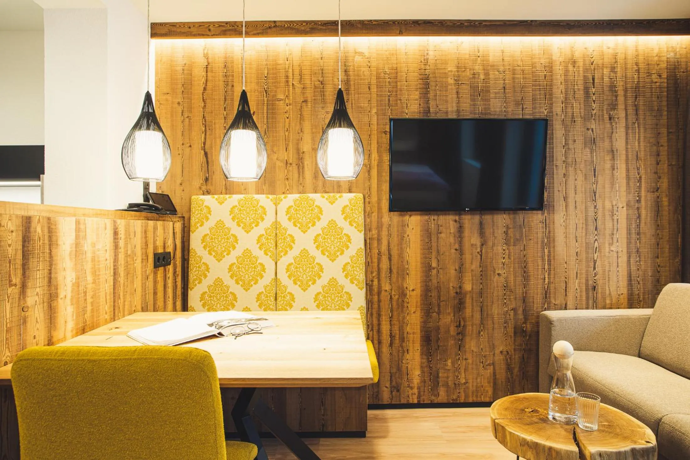 Seating area, Bed in Austria Aparthotel