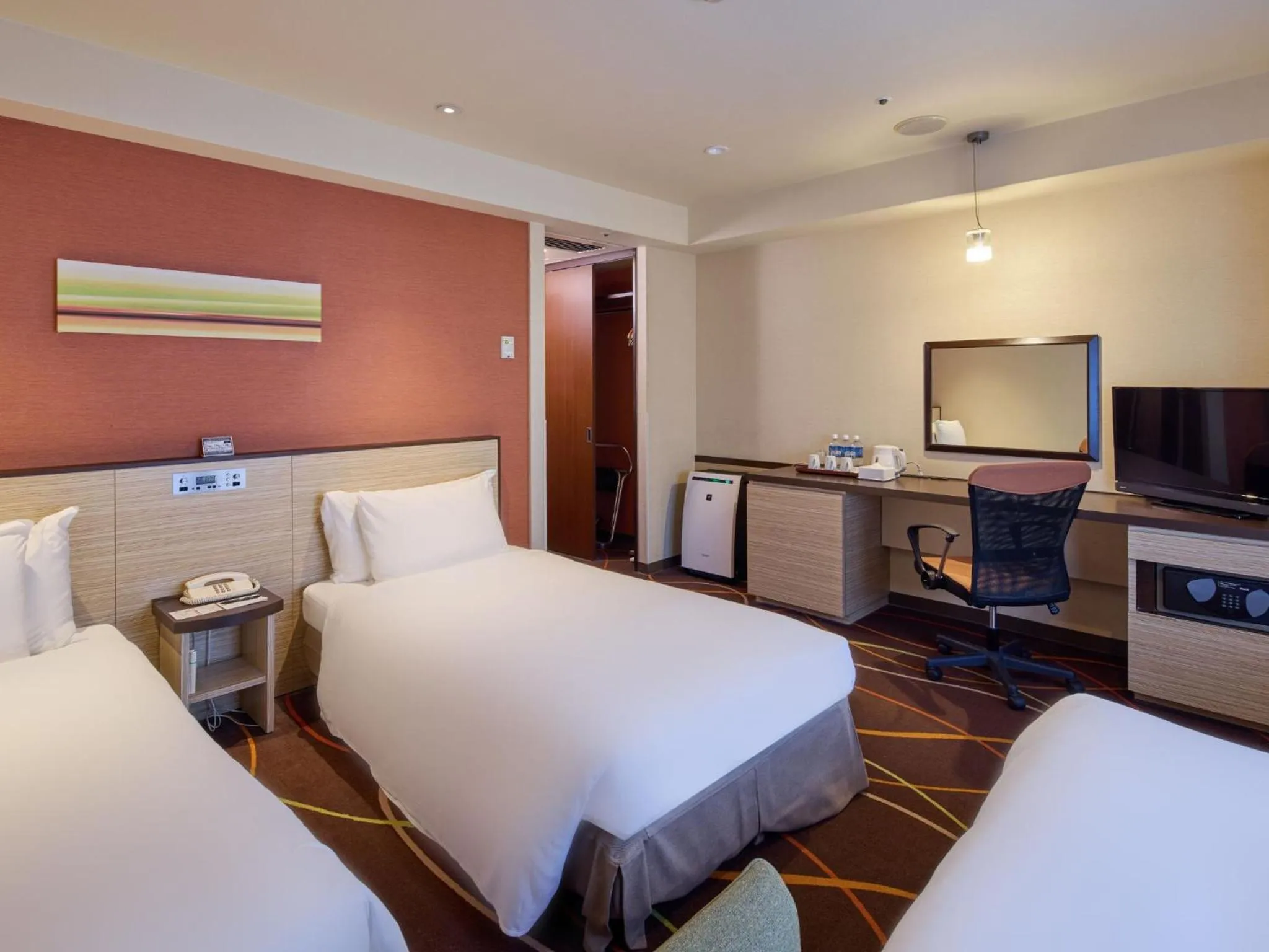 Bed in Okinawa NaHaNa Hotel & Spa