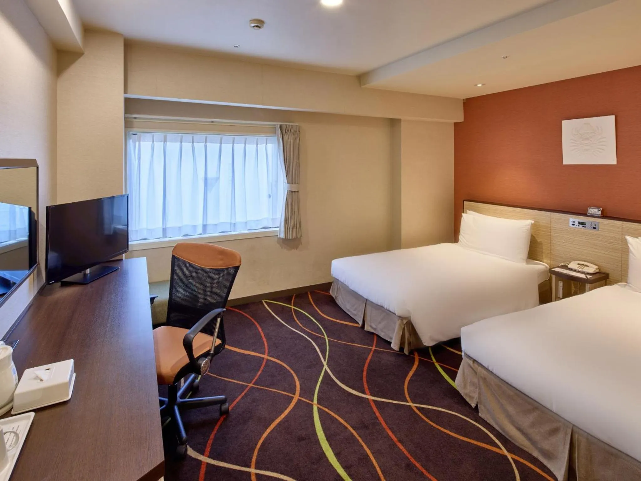 Bed in Okinawa NaHaNa Hotel & Spa