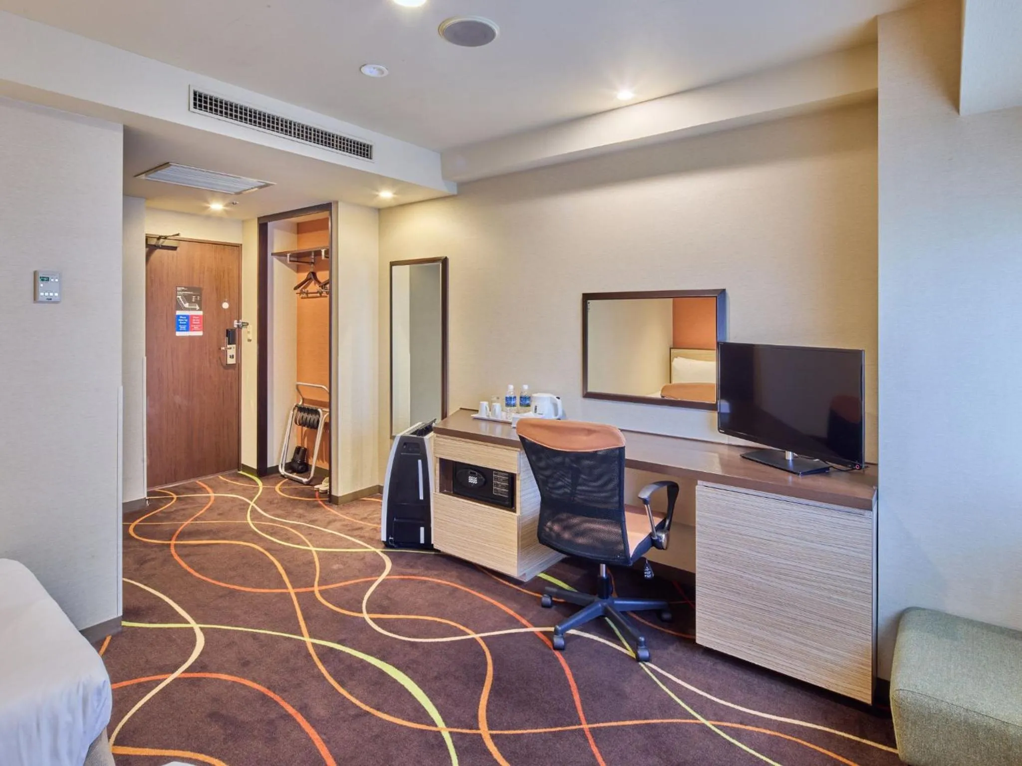 Photo of the whole room, Bed in Okinawa NaHaNa Hotel & Spa