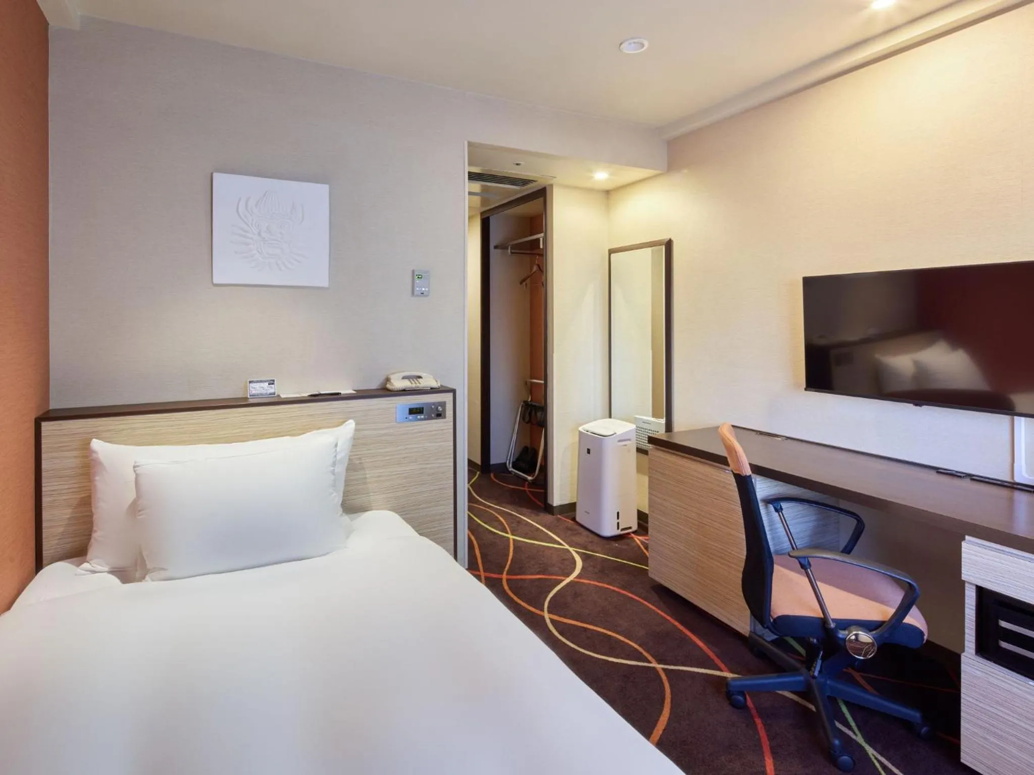 Bed in Okinawa NaHaNa Hotel & Spa