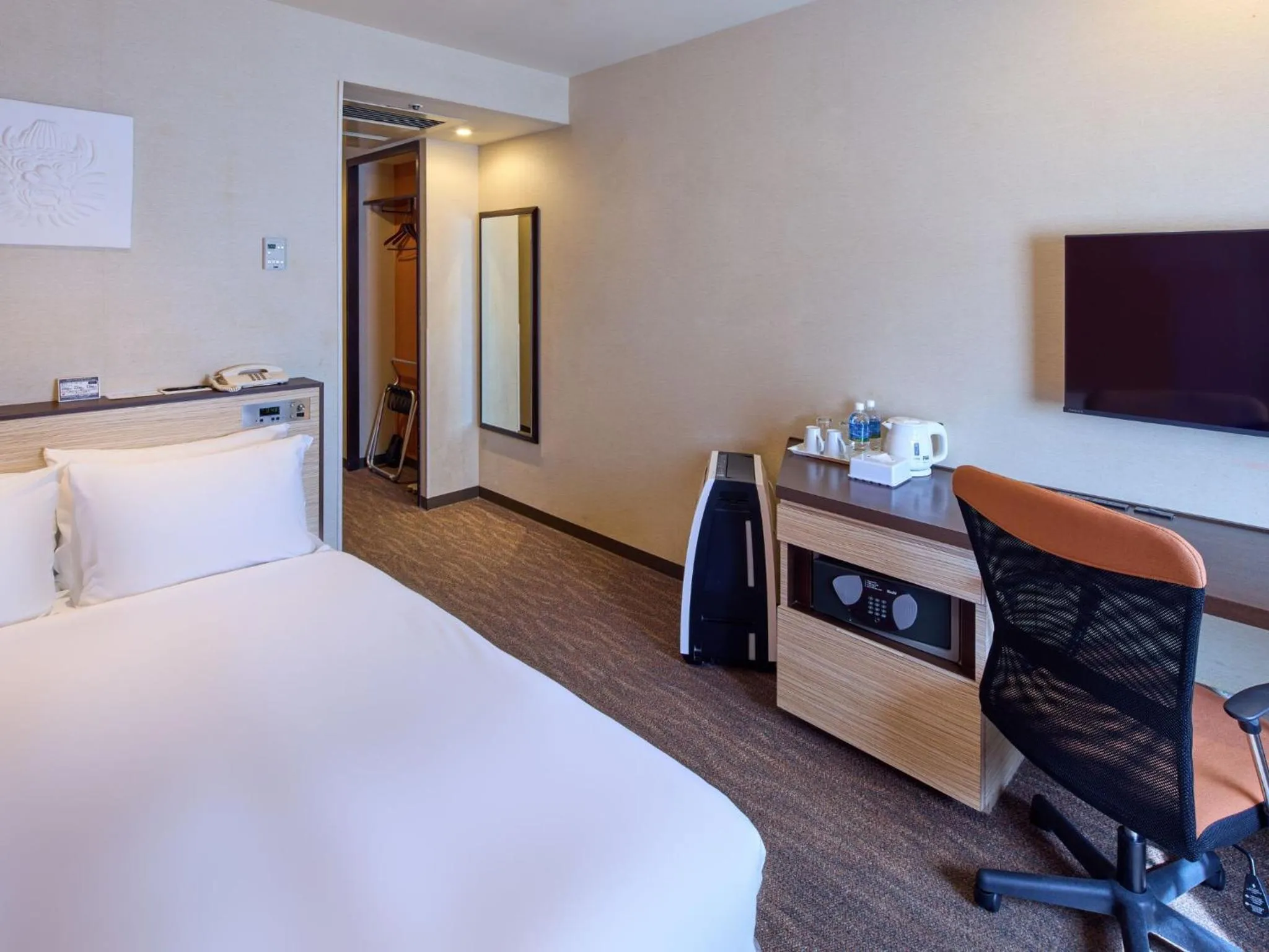 Bed in Okinawa NaHaNa Hotel & Spa