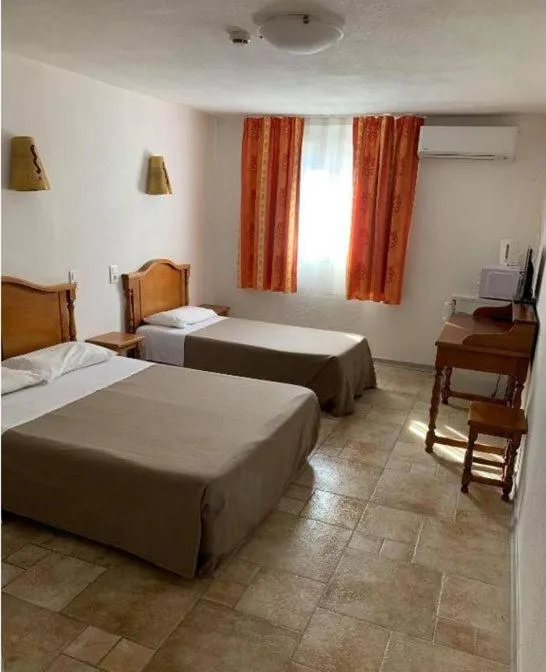 Bed in Apart'Hôtel Les 4 Sources