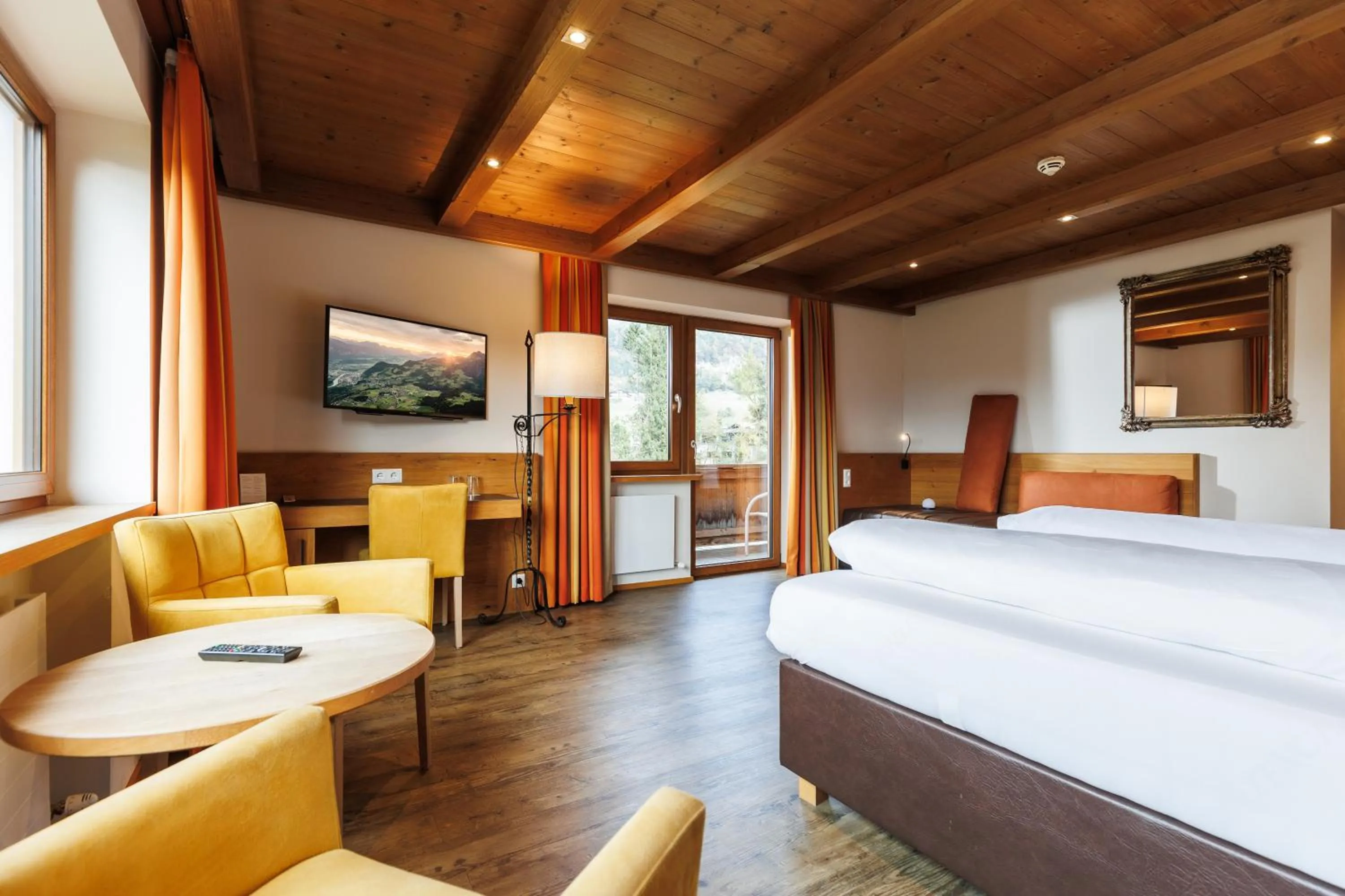 Seating area, Bed in Hotel Landgasthof Gappen