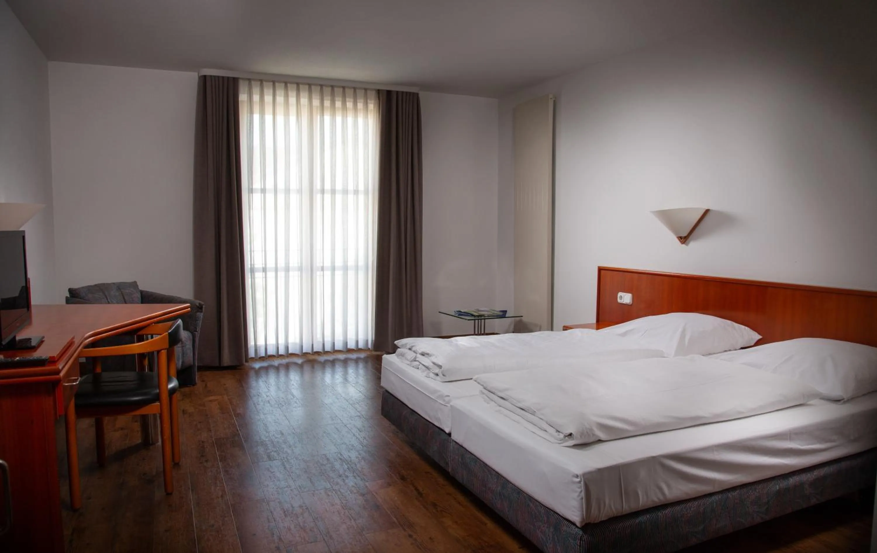 Bed in Altstadthotel Brauereigasthof Winkler