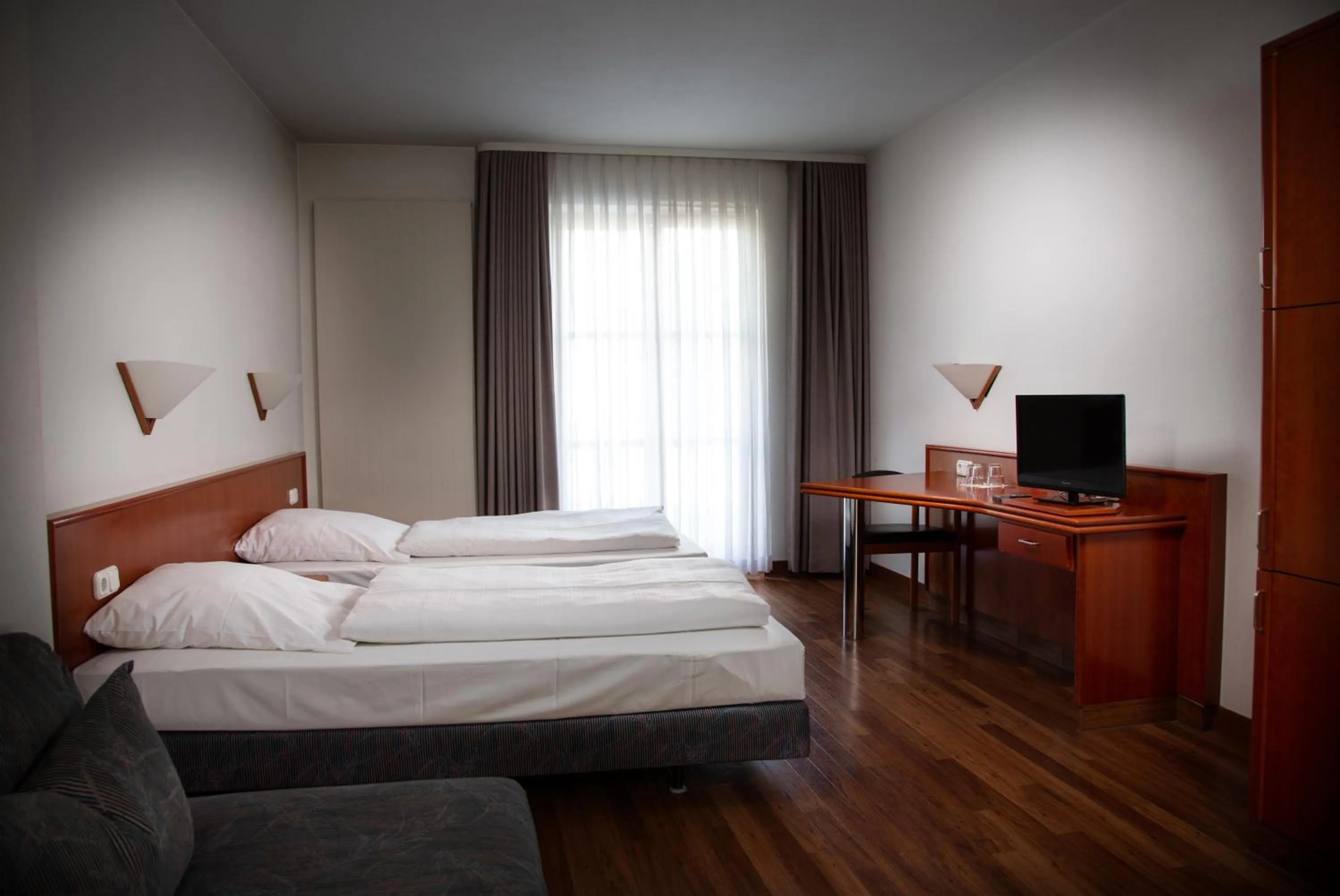 Bed in Altstadthotel Brauereigasthof Winkler