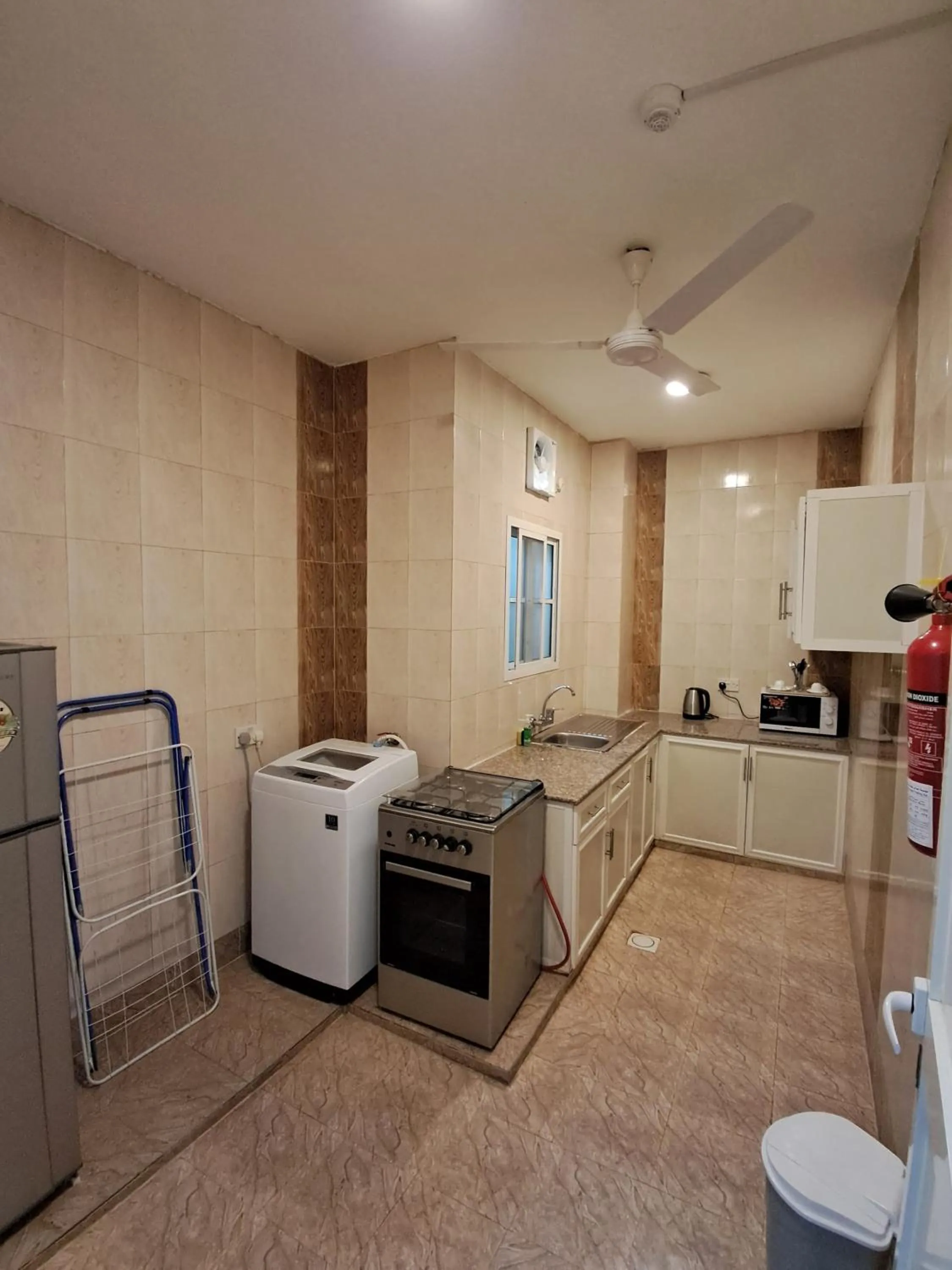 Kitchen or kitchenette in Gateway Salalah hotel apartments
