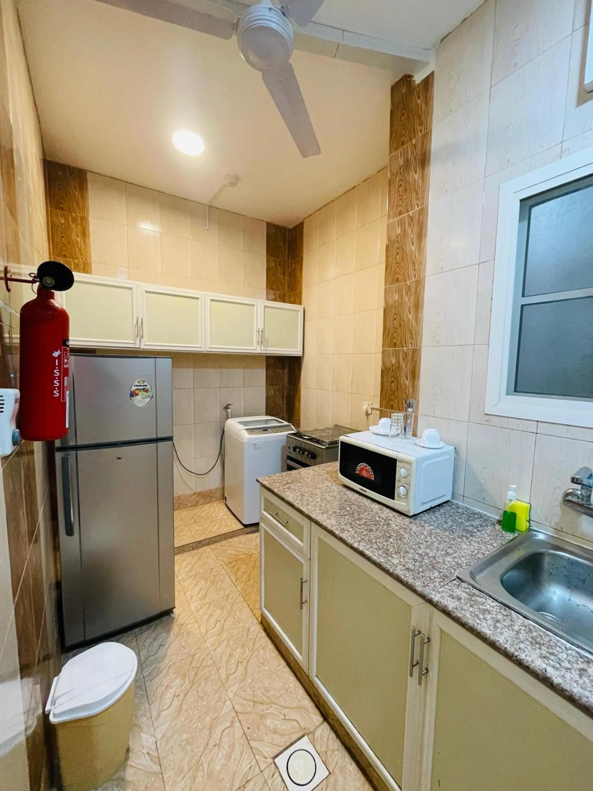 Kitchen or kitchenette in Gateway Salalah hotel apartments