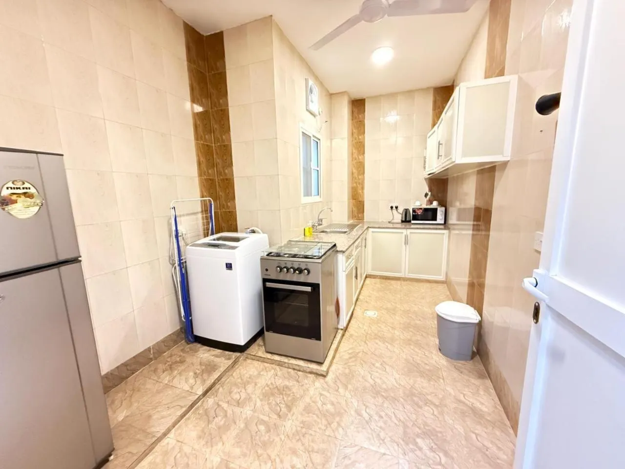 Kitchen or kitchenette in Gateway Salalah hotel apartments