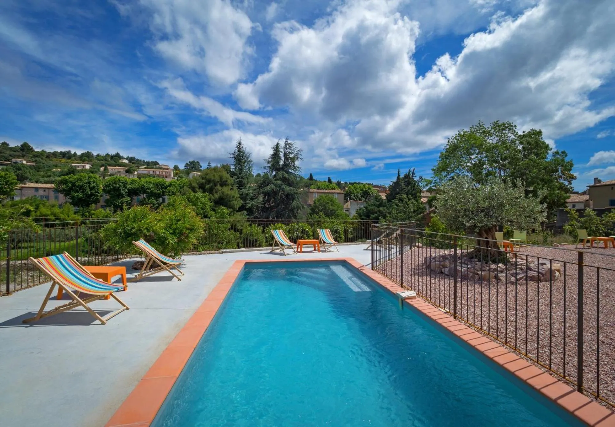 Garden view in Contact Hôtel Le Minervois - Hôtel & Restaurant Au nord de Carcassonne