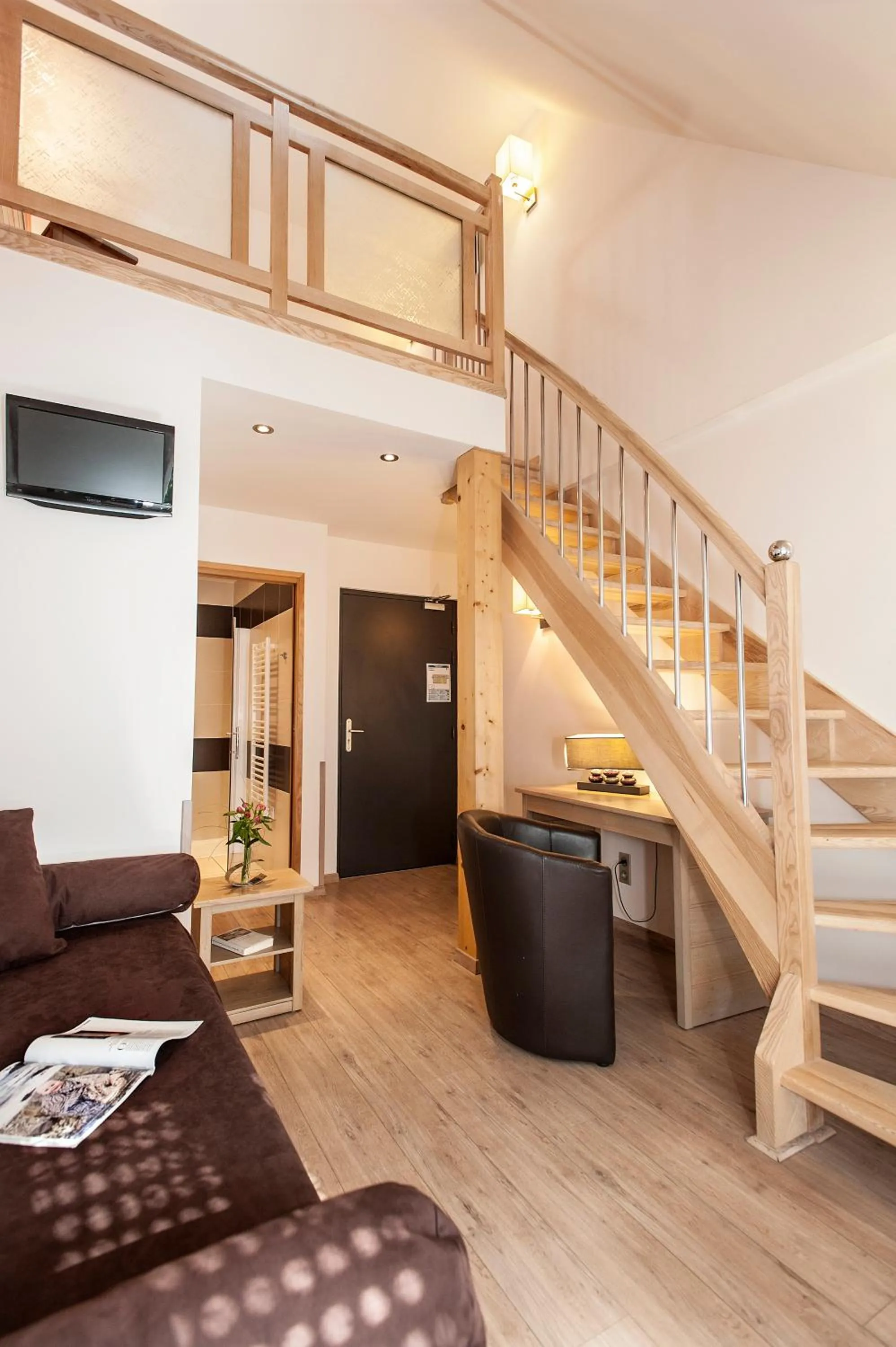 Living room in Logis Hôtel Restaurant Les 2 Rives - A75, en bordure de rivière